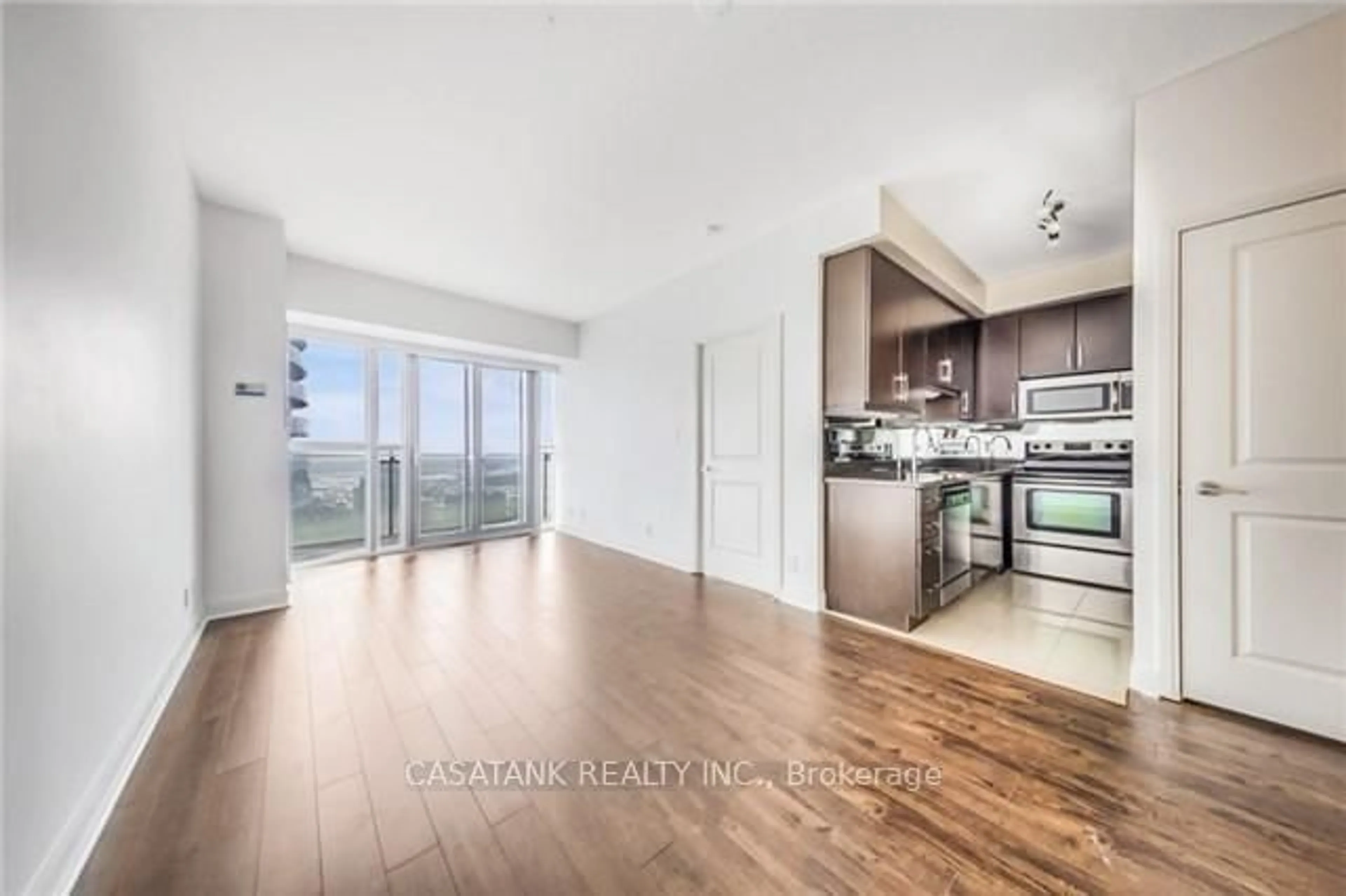 Open concept kitchen, wood/laminate floor for 50 Absolute Ave #4005, Mississauga Ontario L4Z 0A8
