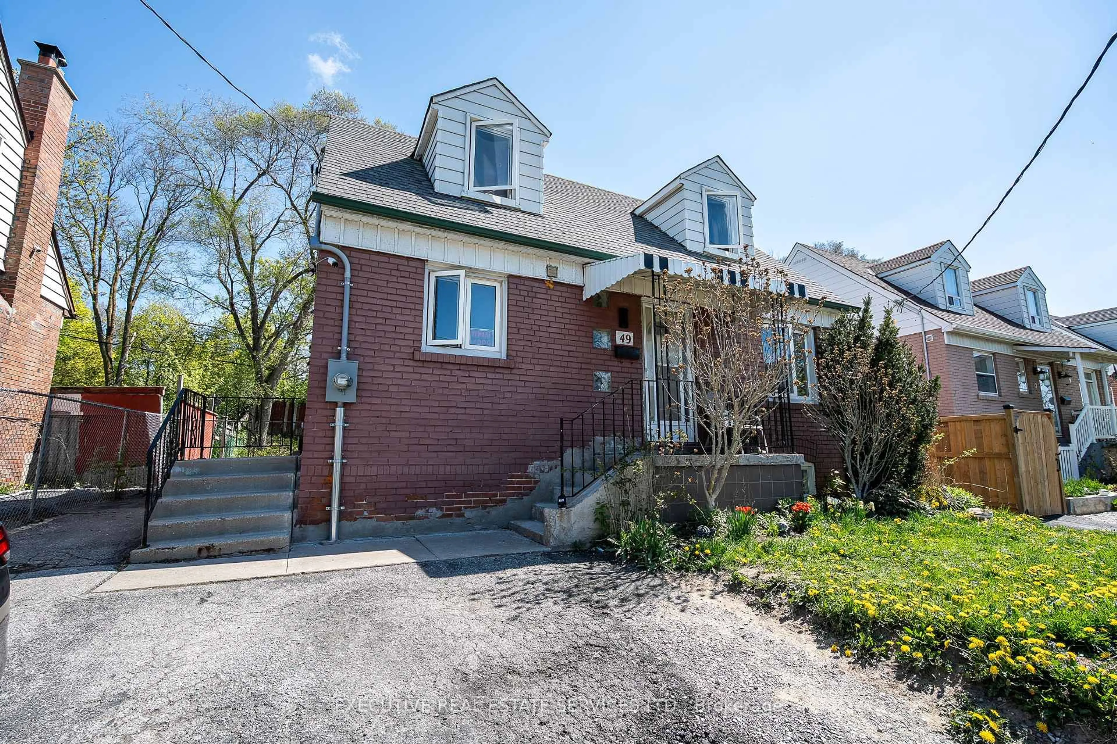 Home with brick exterior material, street for 49 Trethewey Dr, Toronto Ontario M6M 4B1