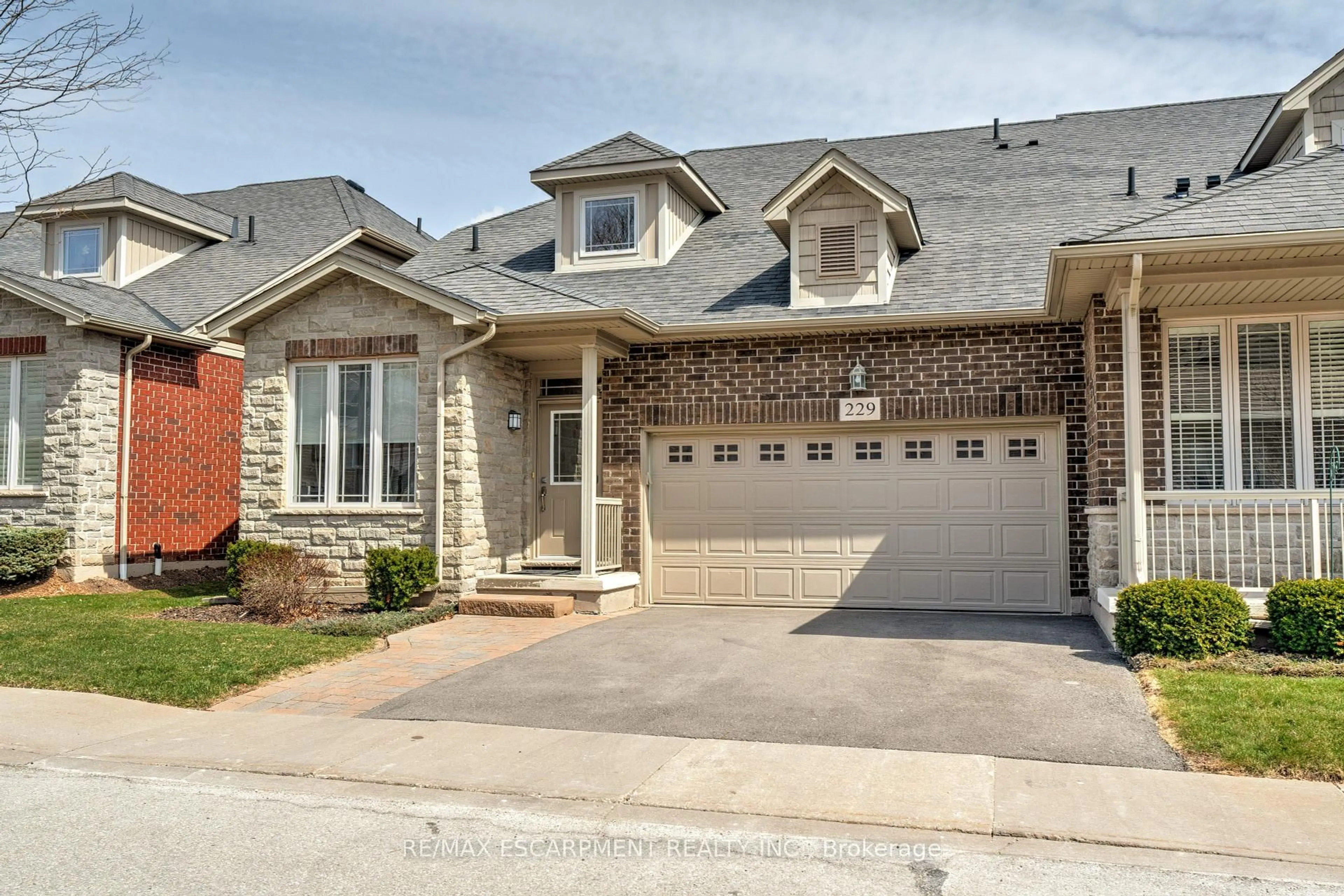 Home with brick exterior material, street for 2120 Itabashi Way #229, Burlington Ontario L7M 0V3
