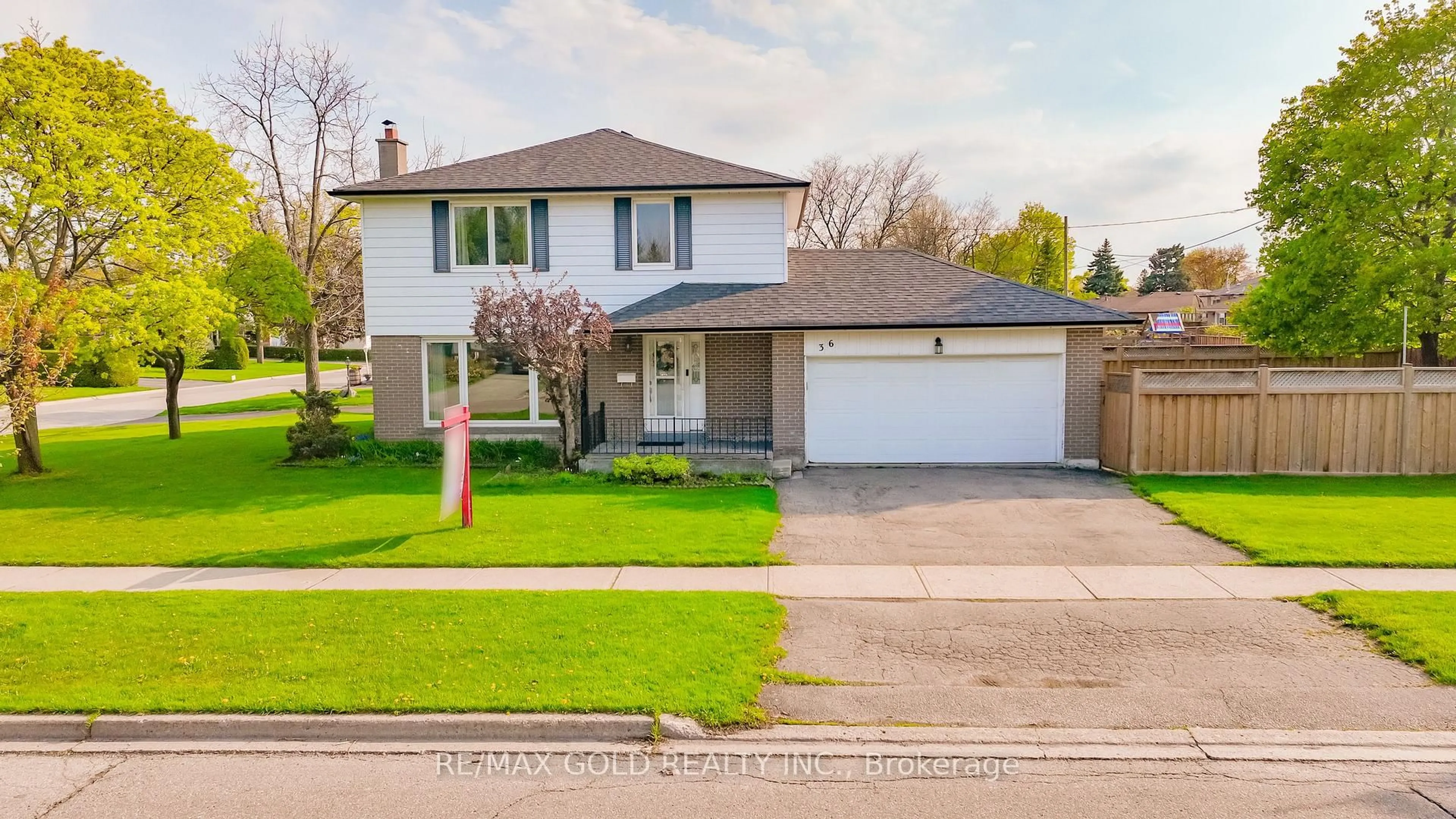 Home with vinyl exterior material, street for 36 Dorchester Dr, Brampton Ontario L6T 3E1