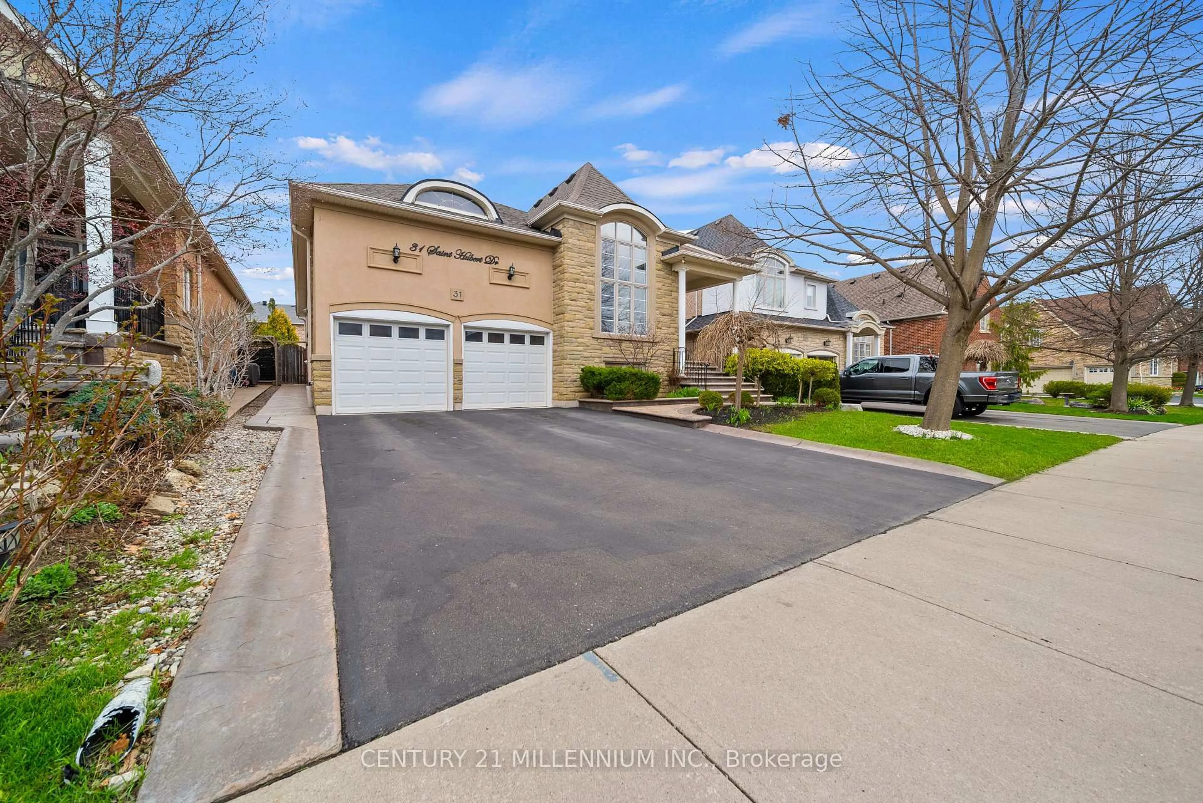 Home with brick exterior material, street for 31 Saint Hubert Dr, Brampton Ontario L6P 1W1