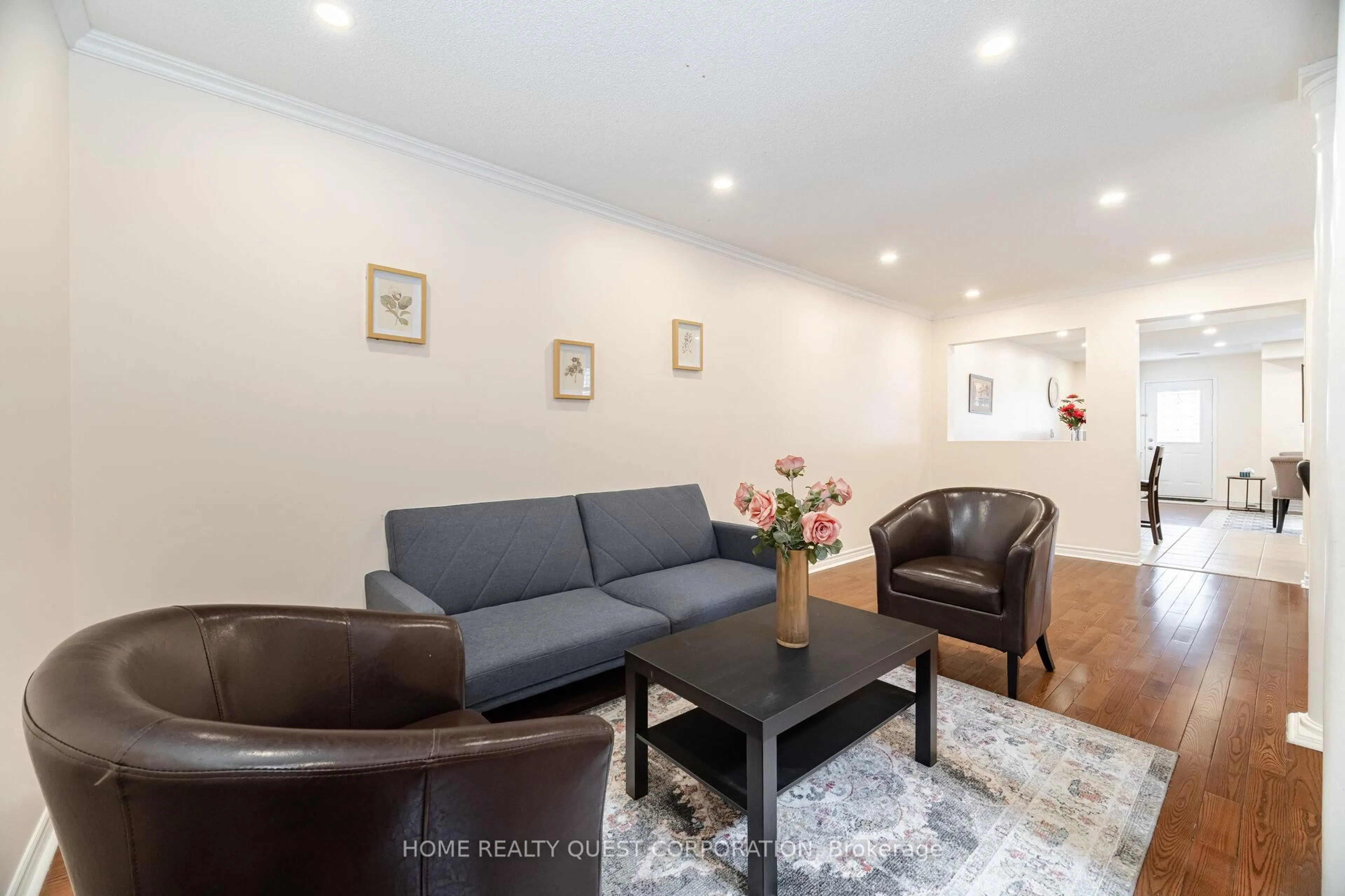 Living room with furniture, wood/laminate floor for 1322 Mowat Lane, Milton Ontario L9T 6C2
