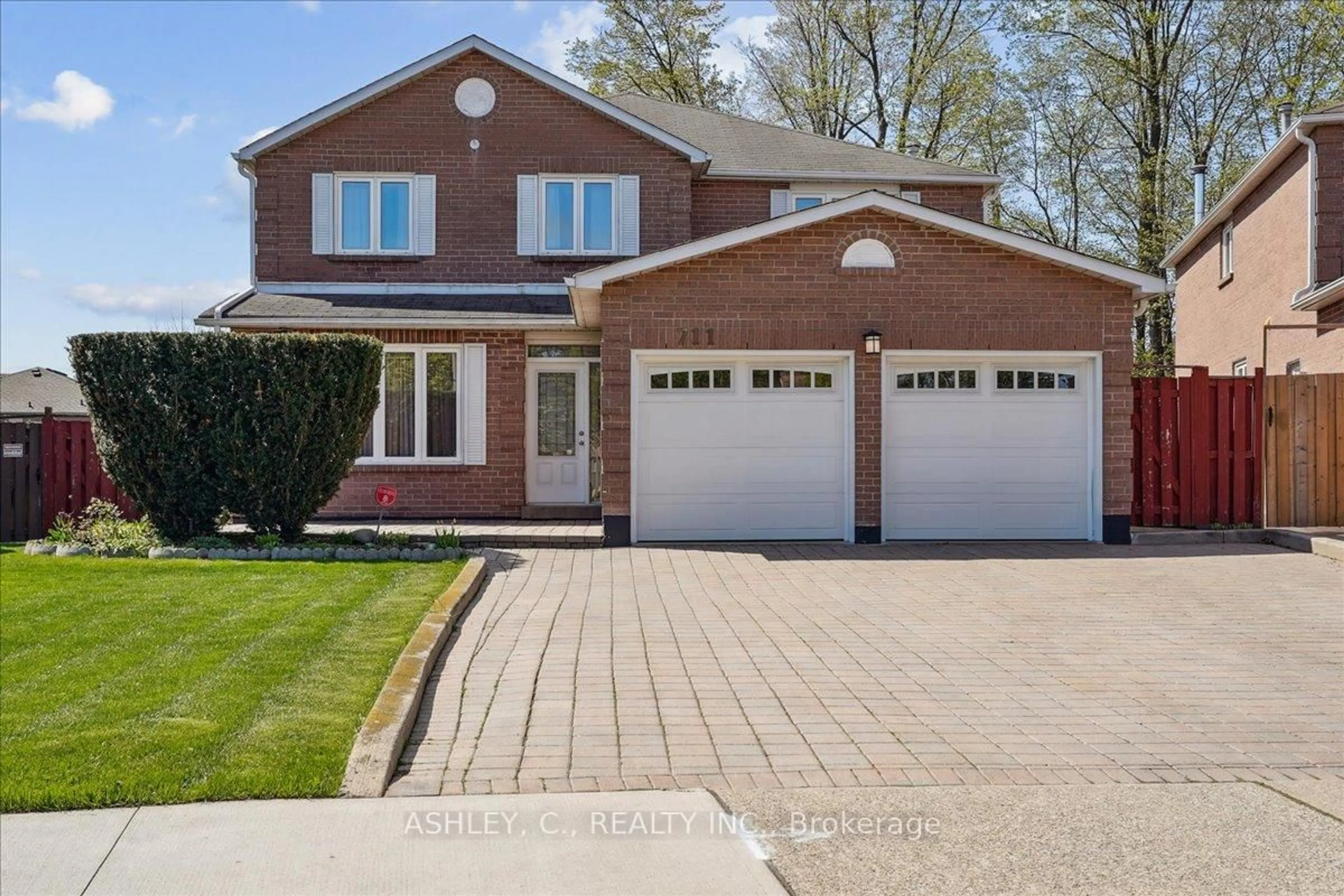 Home with brick exterior material, street for 711 Esprit Cres, Mississauga Ontario L5R 3C1