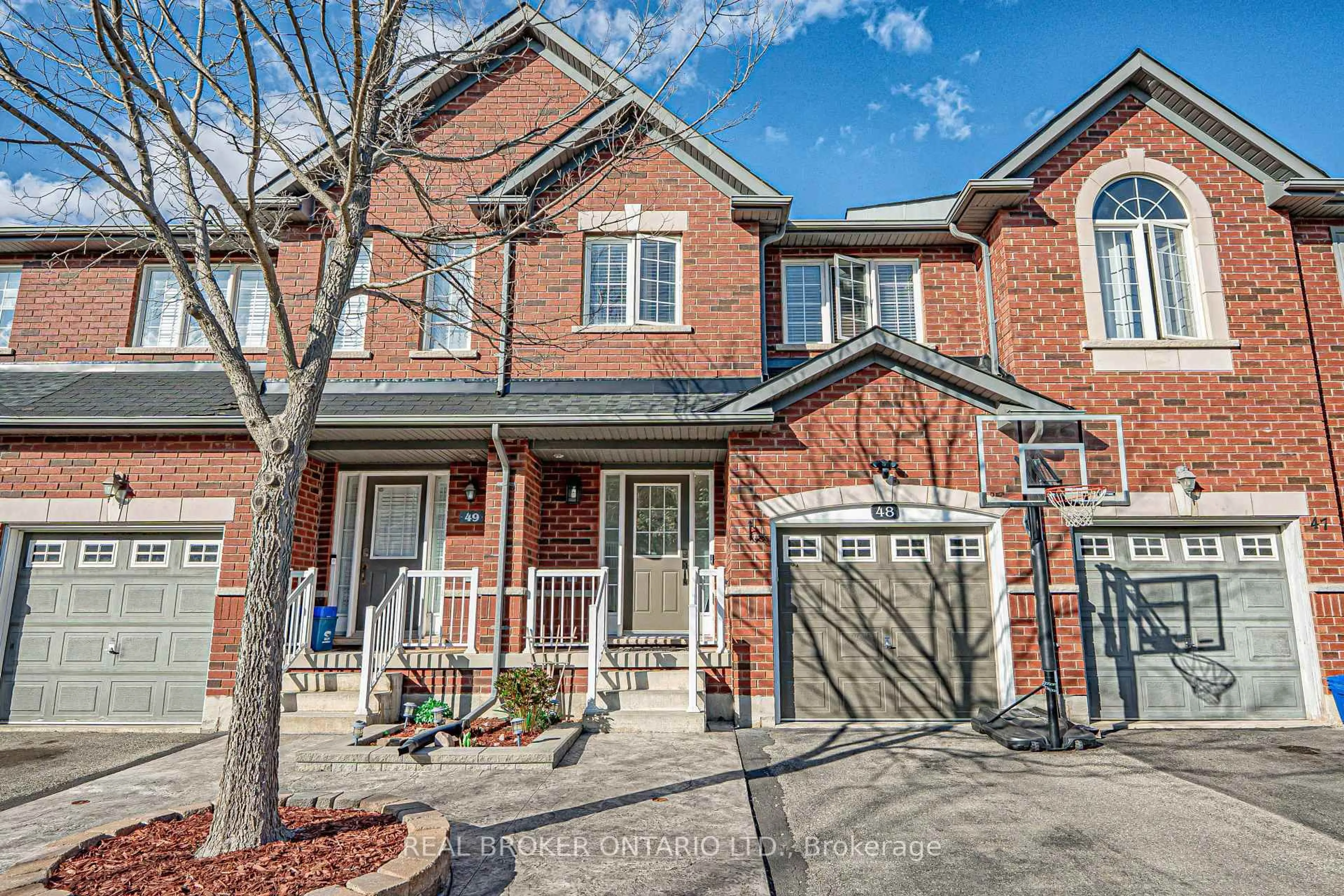 Home with brick exterior material, street for 620 Ferguson Dr #48, Milton Ontario L9T 0M8