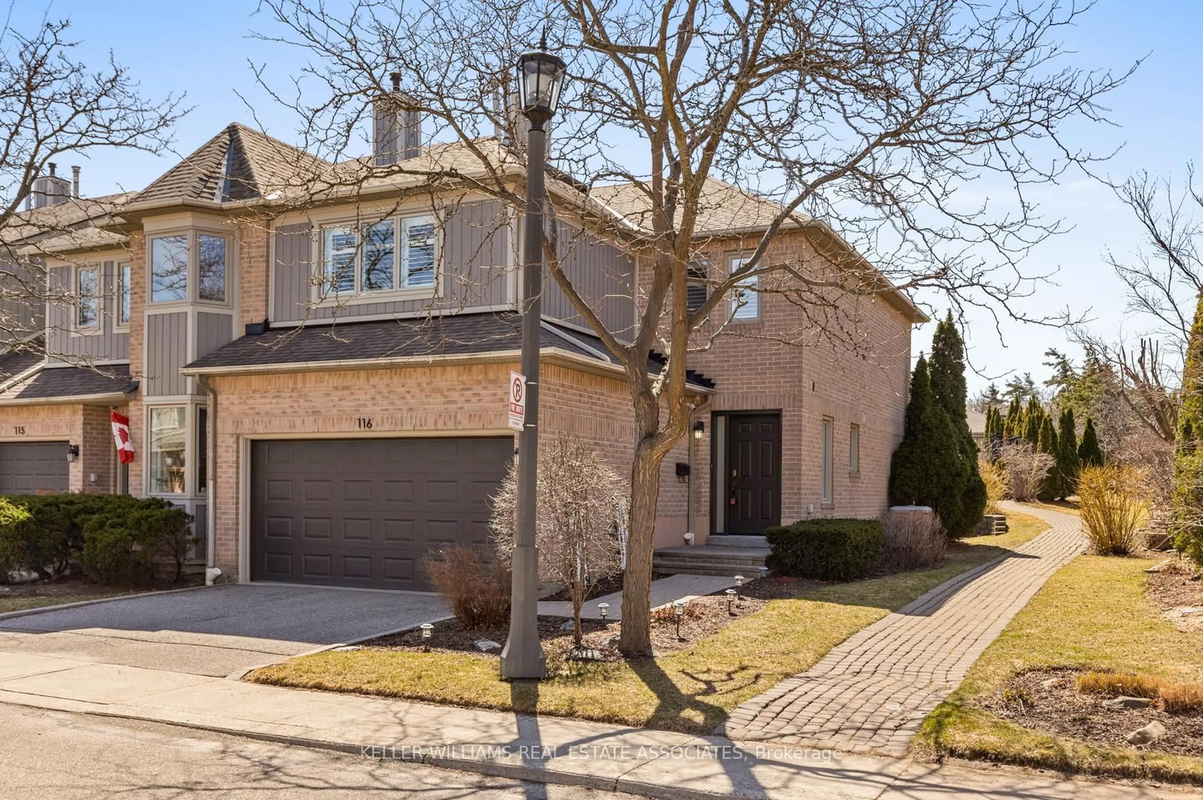 Home with brick exterior material, street for 5480 Glen Erin Dr #116, Mississauga Ontario L5M 5R3
