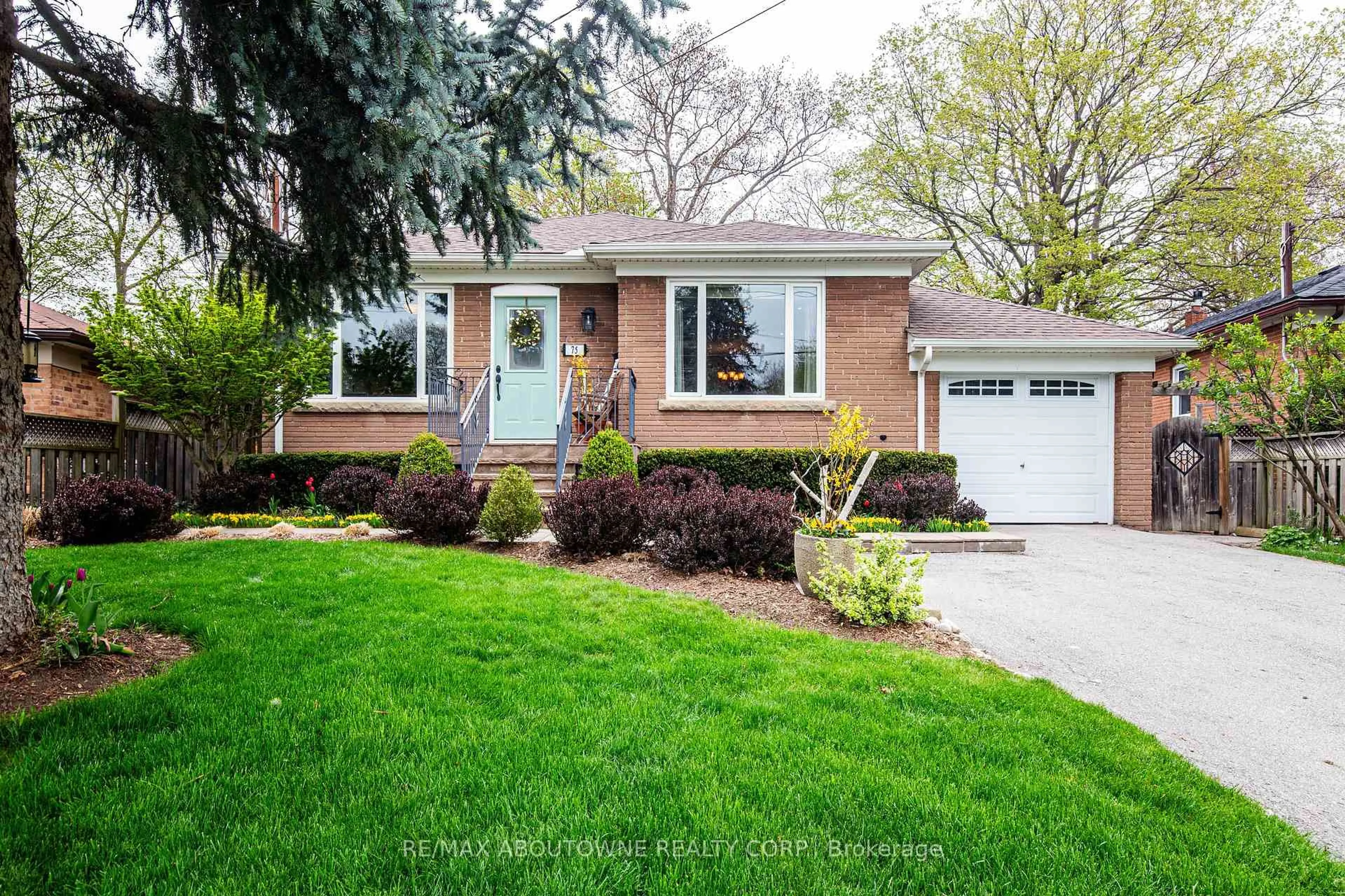Home with brick exterior material, street for 75 Kingswood Rd, Oakville Ontario L6K 2E2