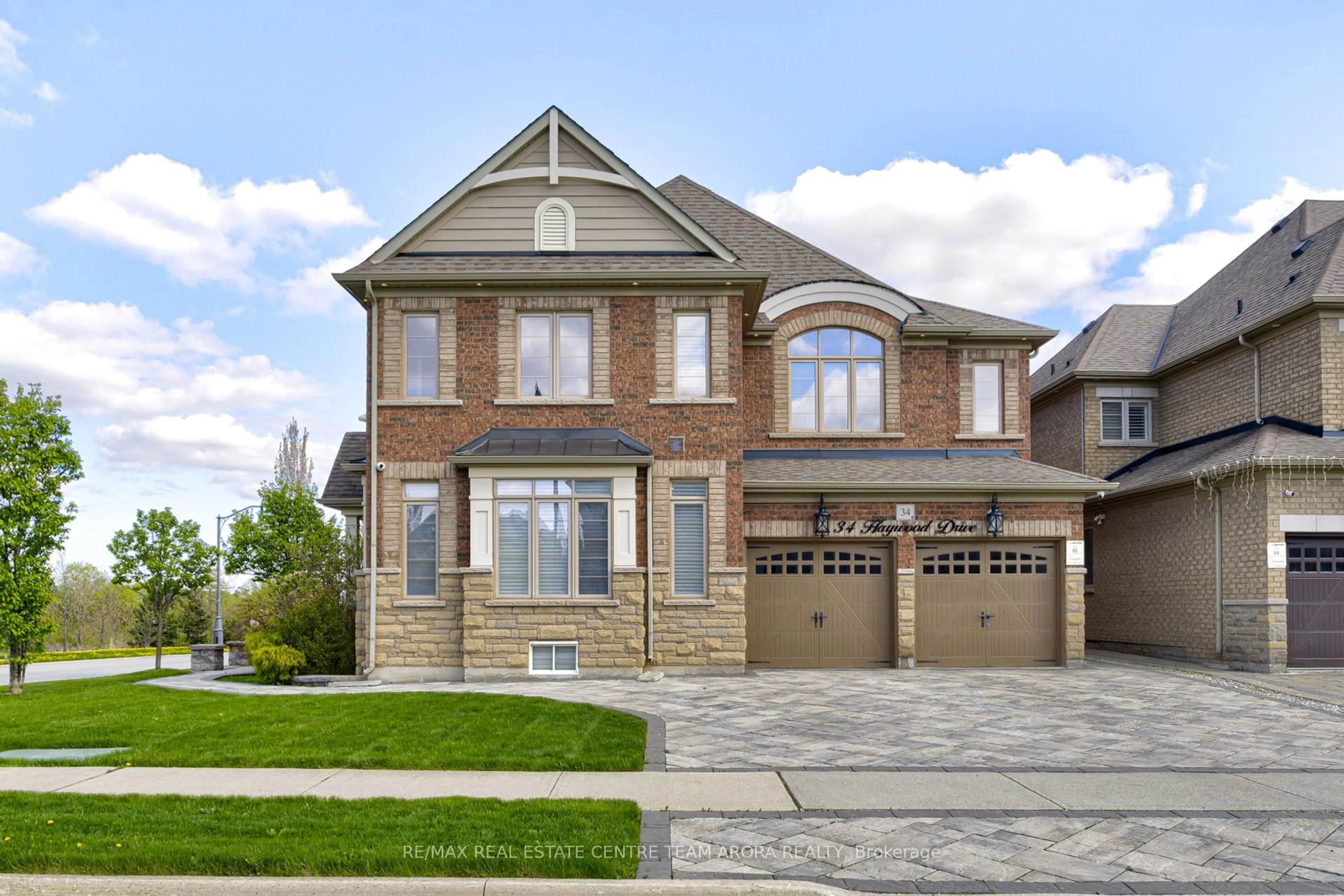 Home with brick exterior material, street for 34 Haywood Dr, Brampton Ontario L6X 0W3