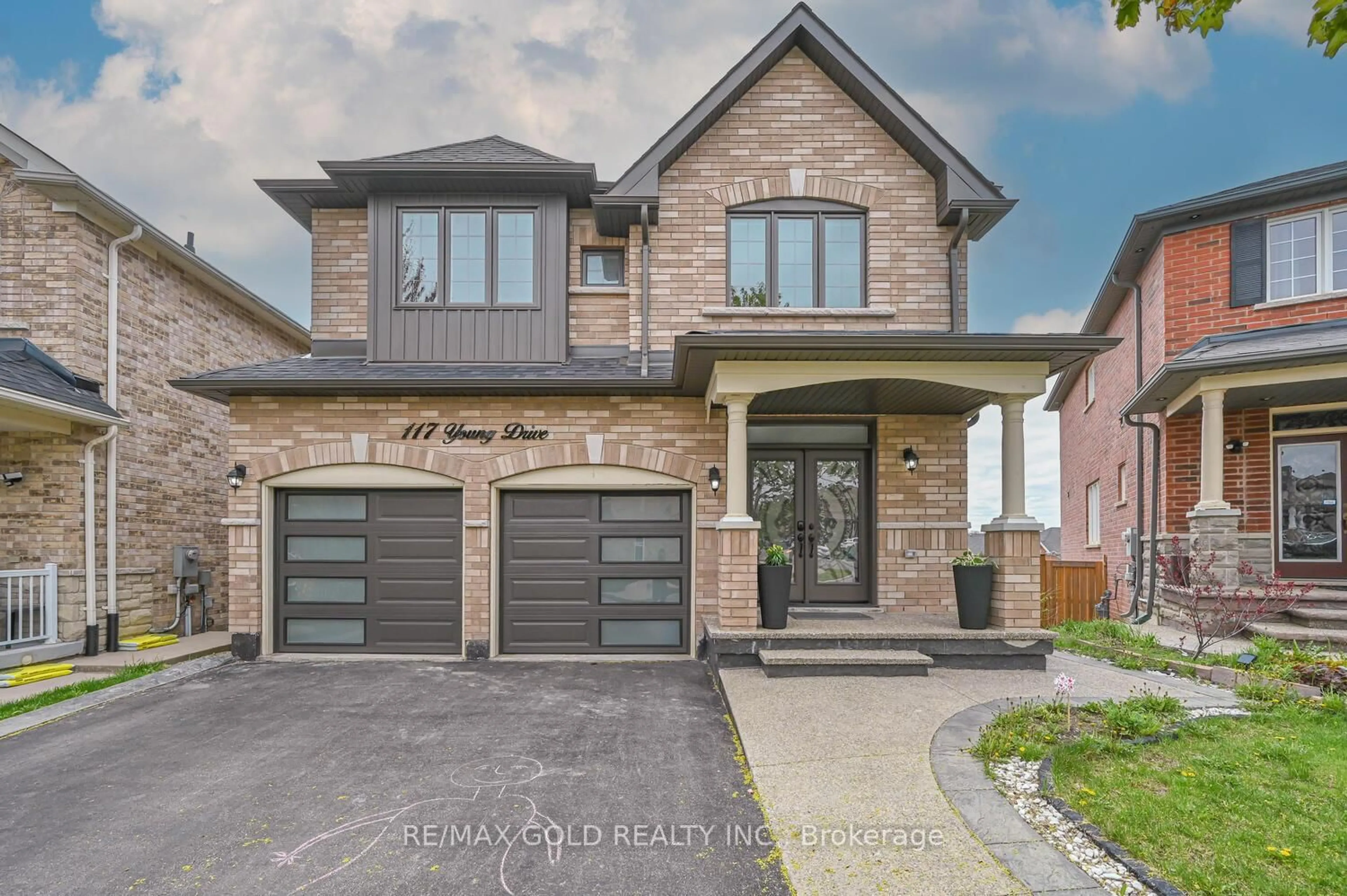 Home with brick exterior material, street for 117 Young Dr, Brampton Ontario L6Y 0N9