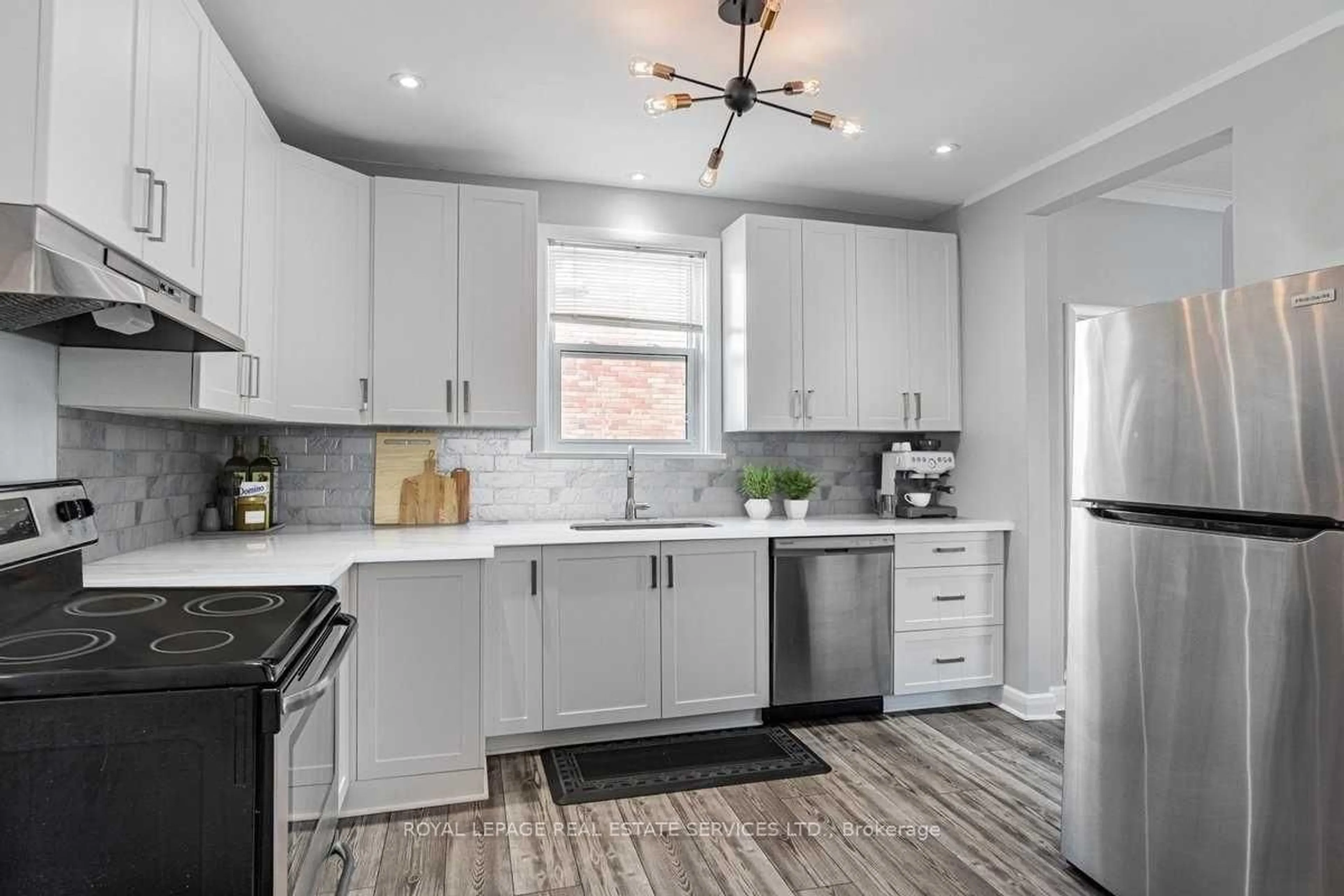 Open concept kitchen, unknown for 2289 Lawrence Ave, Toronto Ontario M9P 2A7
