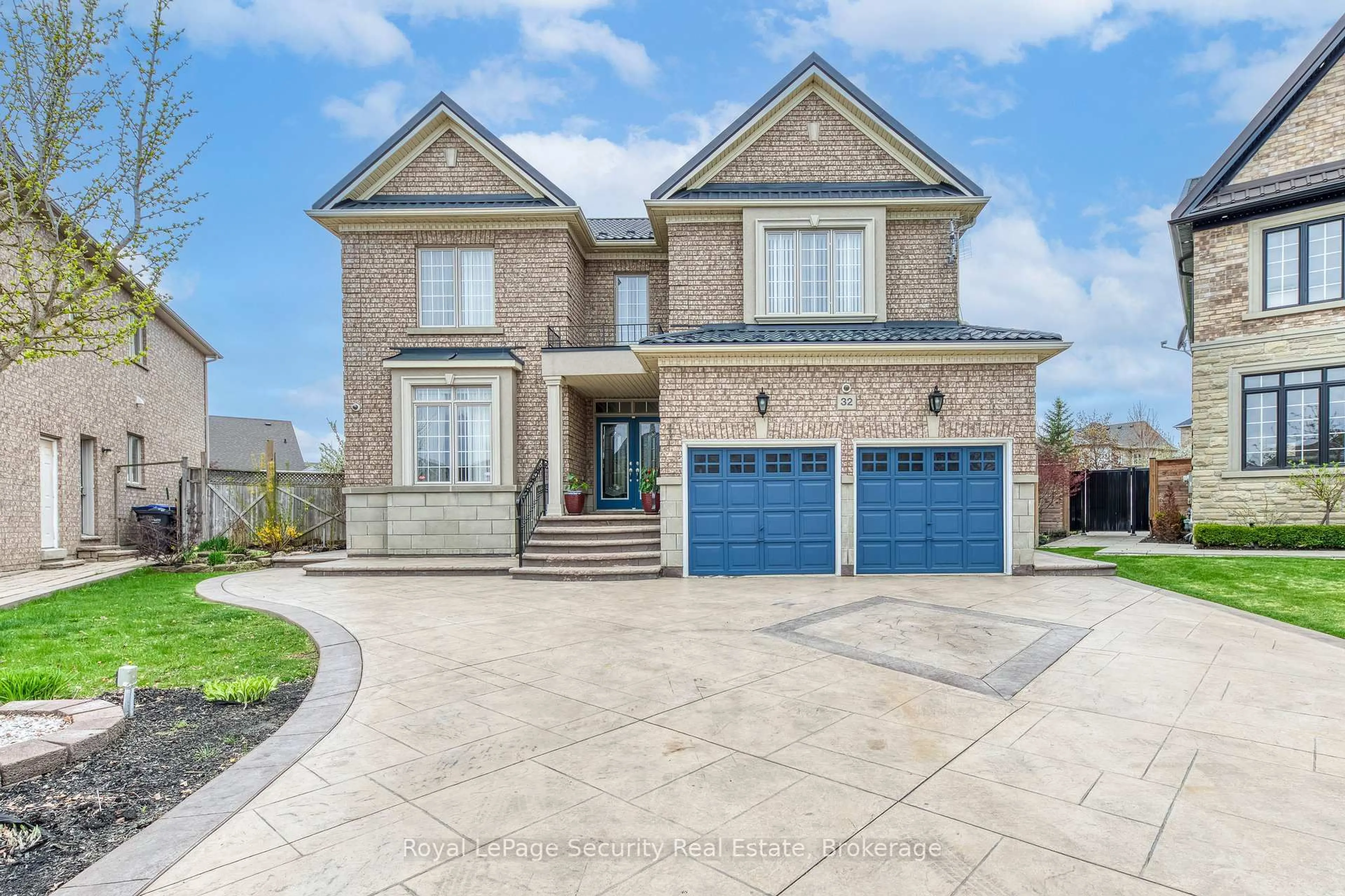 Home with brick exterior material, street for 32 Odeon St, Brampton Ontario L6P 1V3