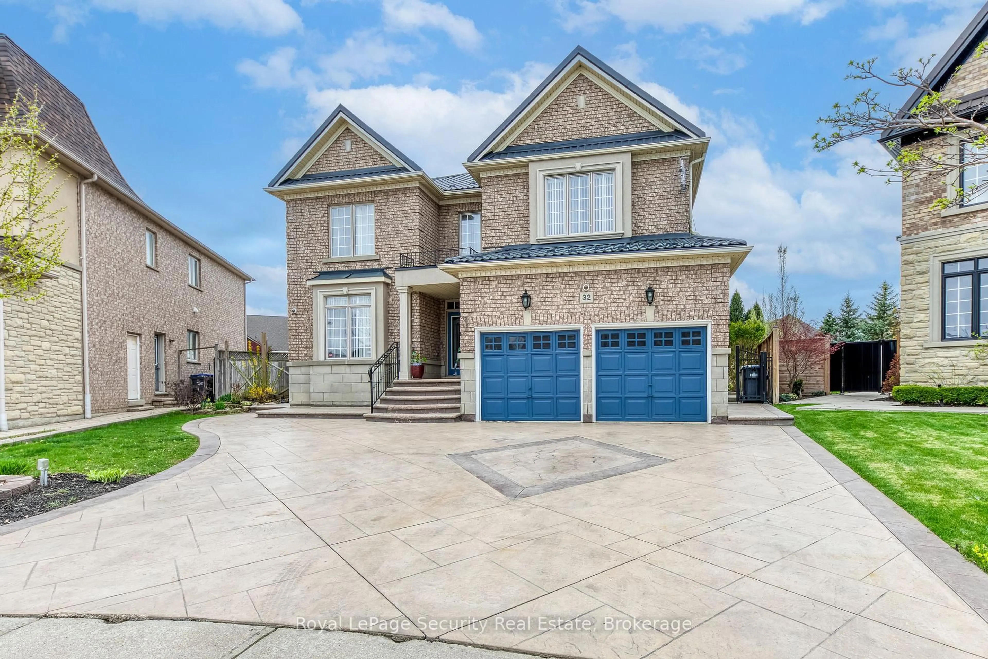 Home with brick exterior material, street for 32 Odeon St, Brampton Ontario L6P 1V3