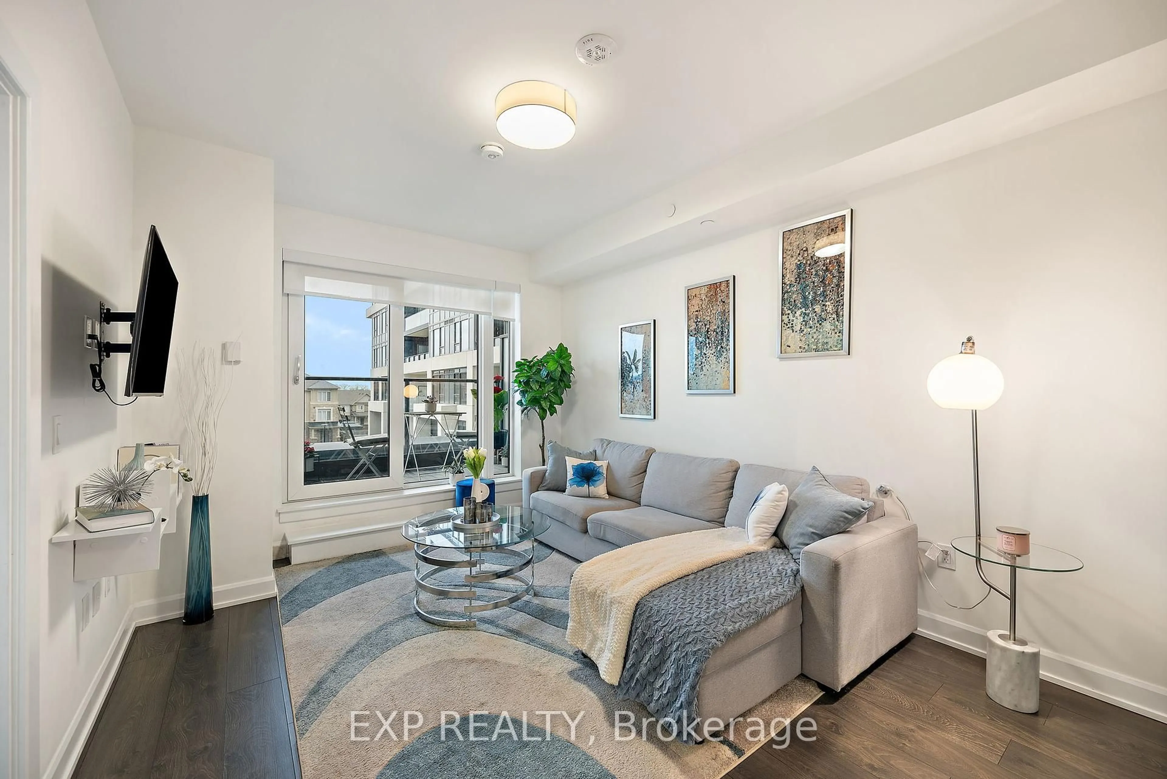Living room with furniture, unknown for 3200 William Coltson Ave #327, Oakville Ontario L6H 7B9