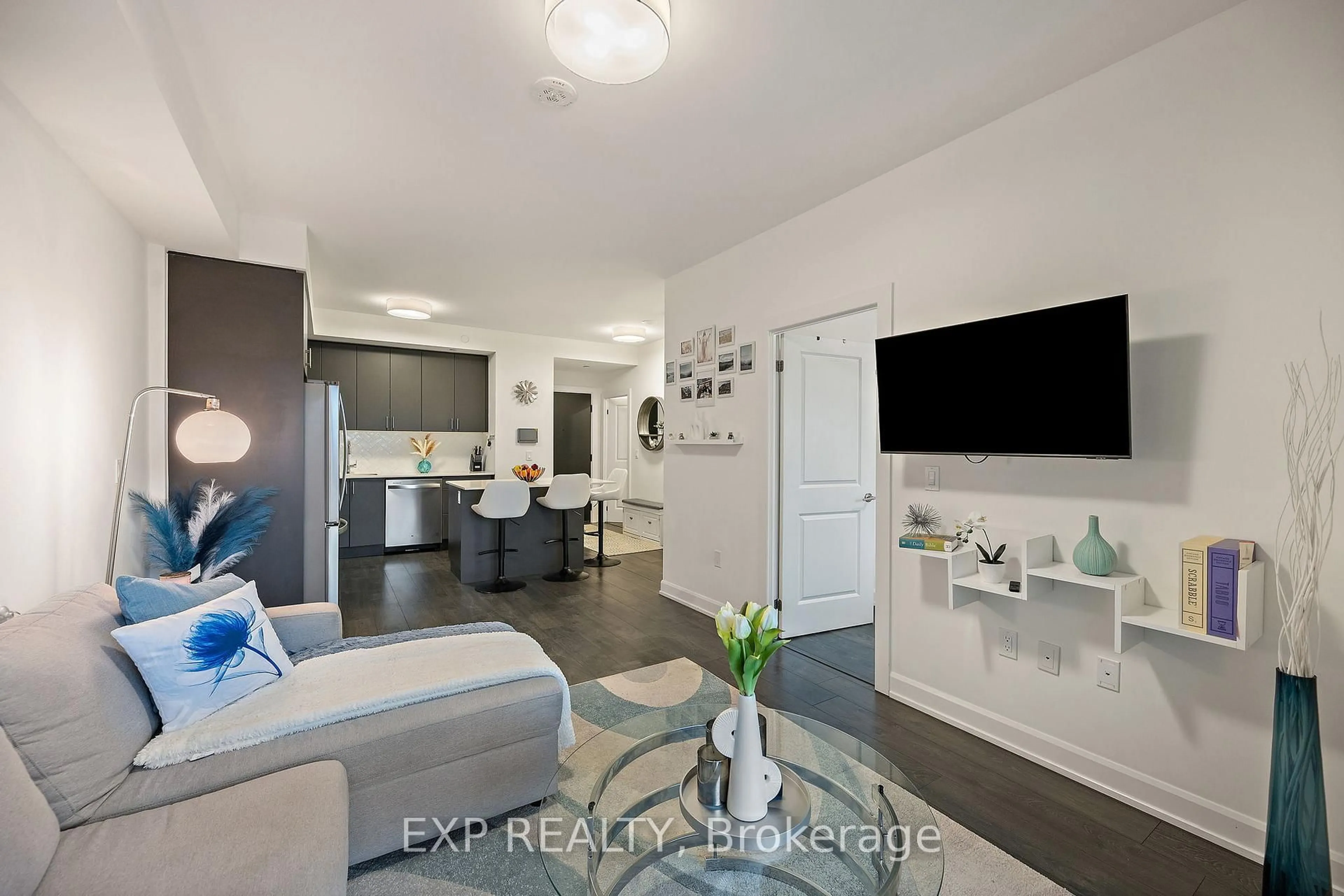 Living room with furniture, ceramic/tile floor for 3200 William Coltson Ave #327, Oakville Ontario L6H 7B9