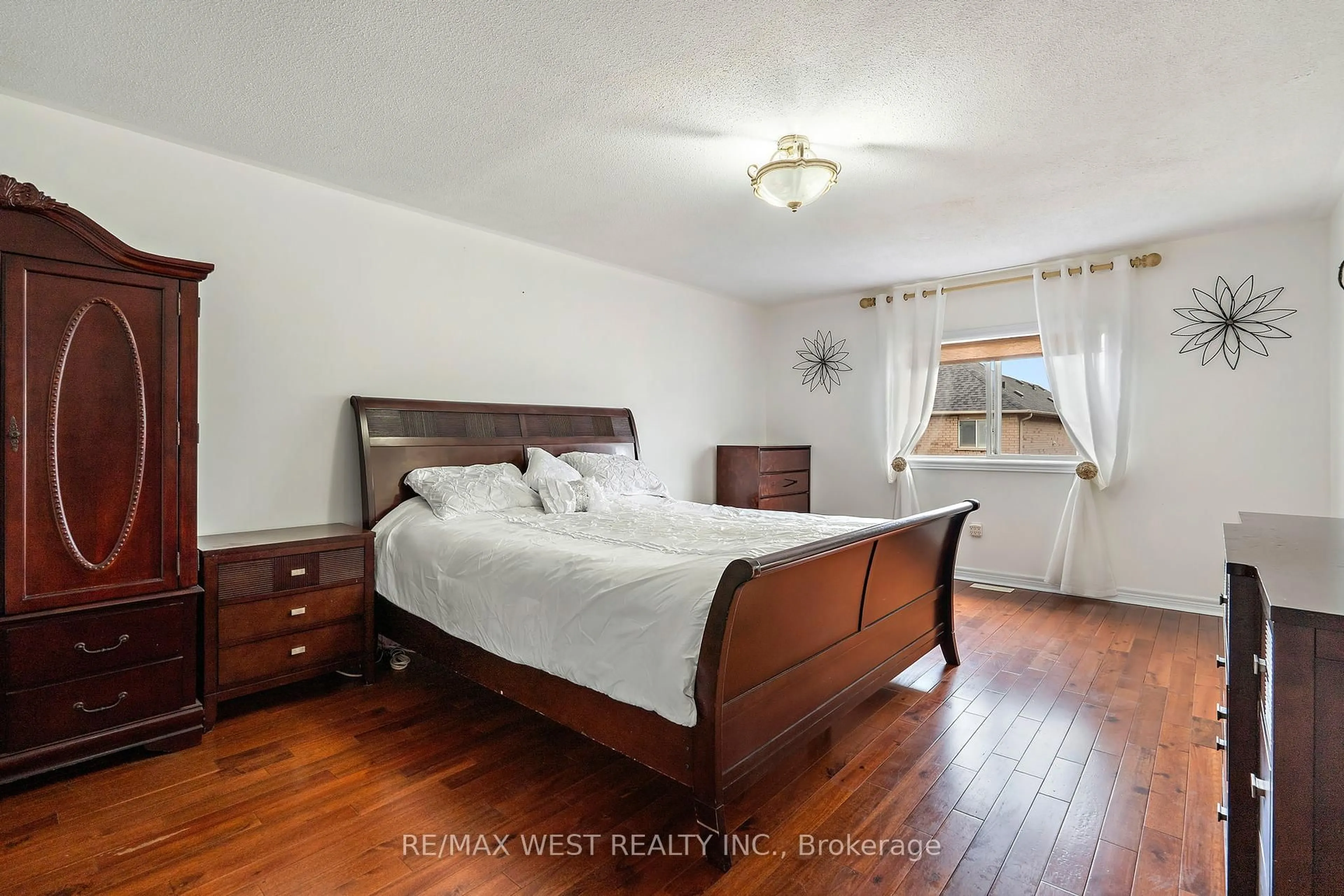 Bedroom with bed, wood/laminate floor for 43 Humbershed Cres, Caledon Ontario L7E 2X3