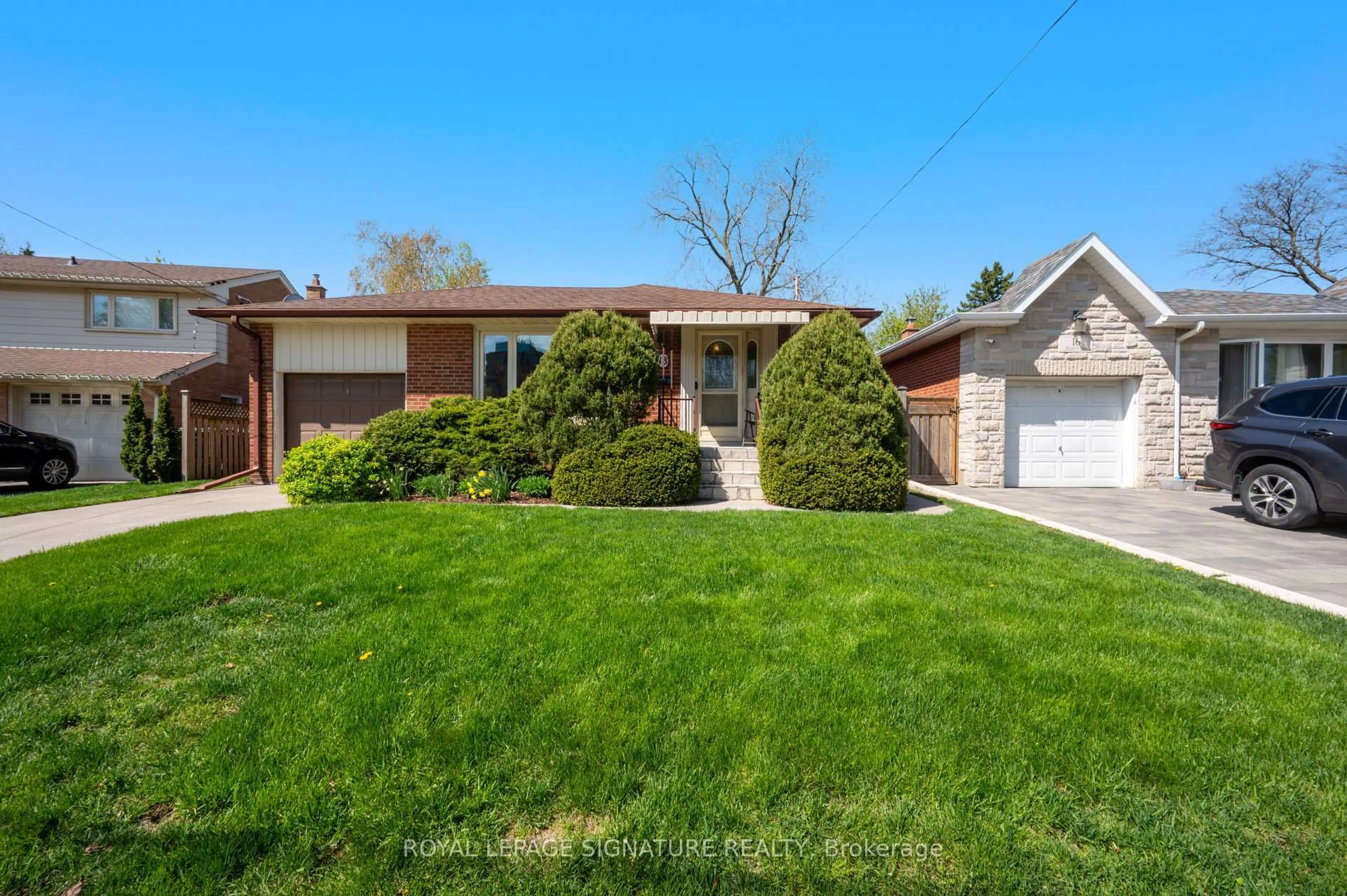 Home with brick exterior material, street for 18 Elderfield Cres, Toronto Ontario M9C 3K7