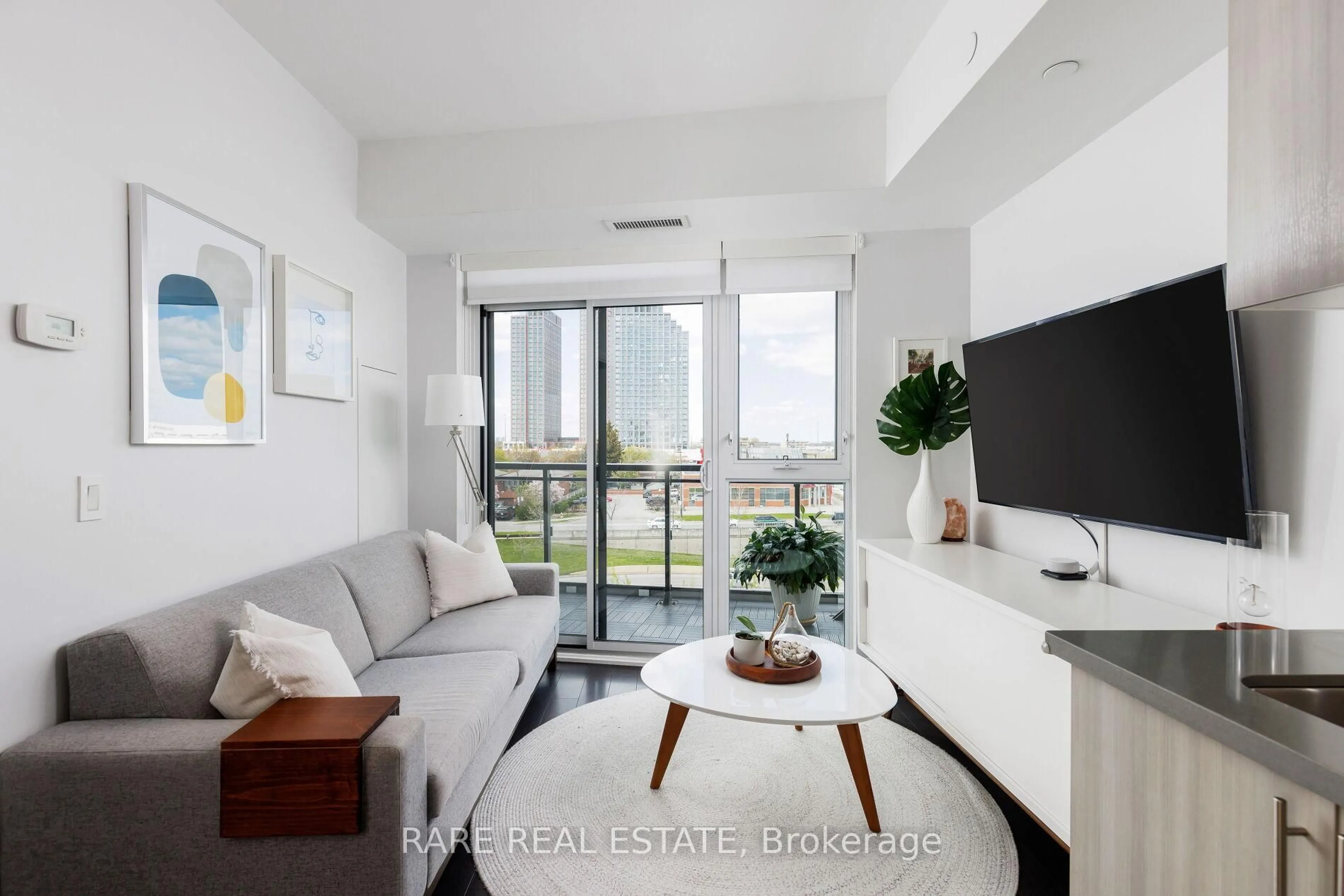 Living room with furniture, unknown for 16 Mcadam Ave #404, Toronto Ontario M6A 1S5