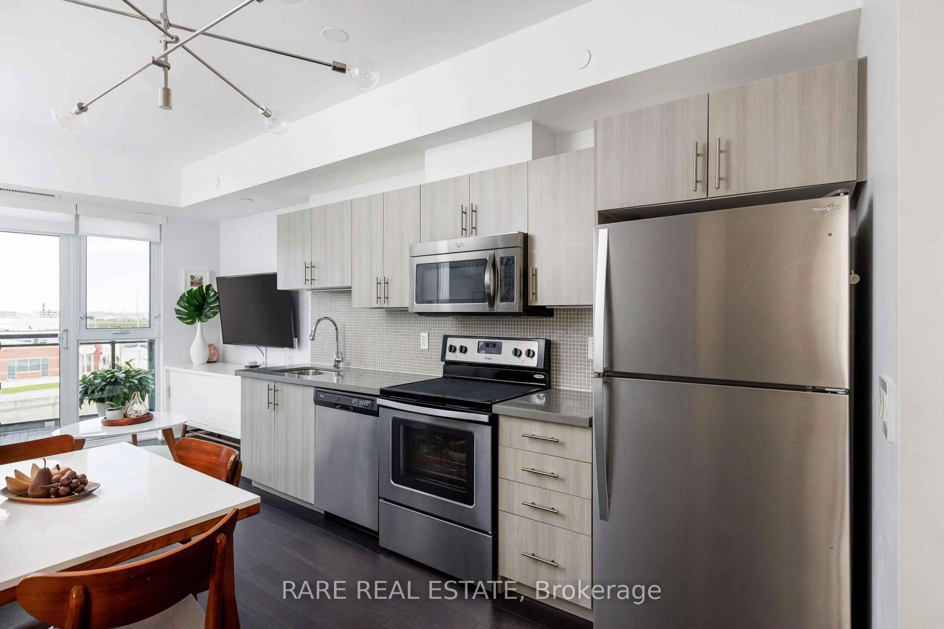 Open concept kitchen, unknown for 16 Mcadam Ave #404, Toronto Ontario M6A 1S5