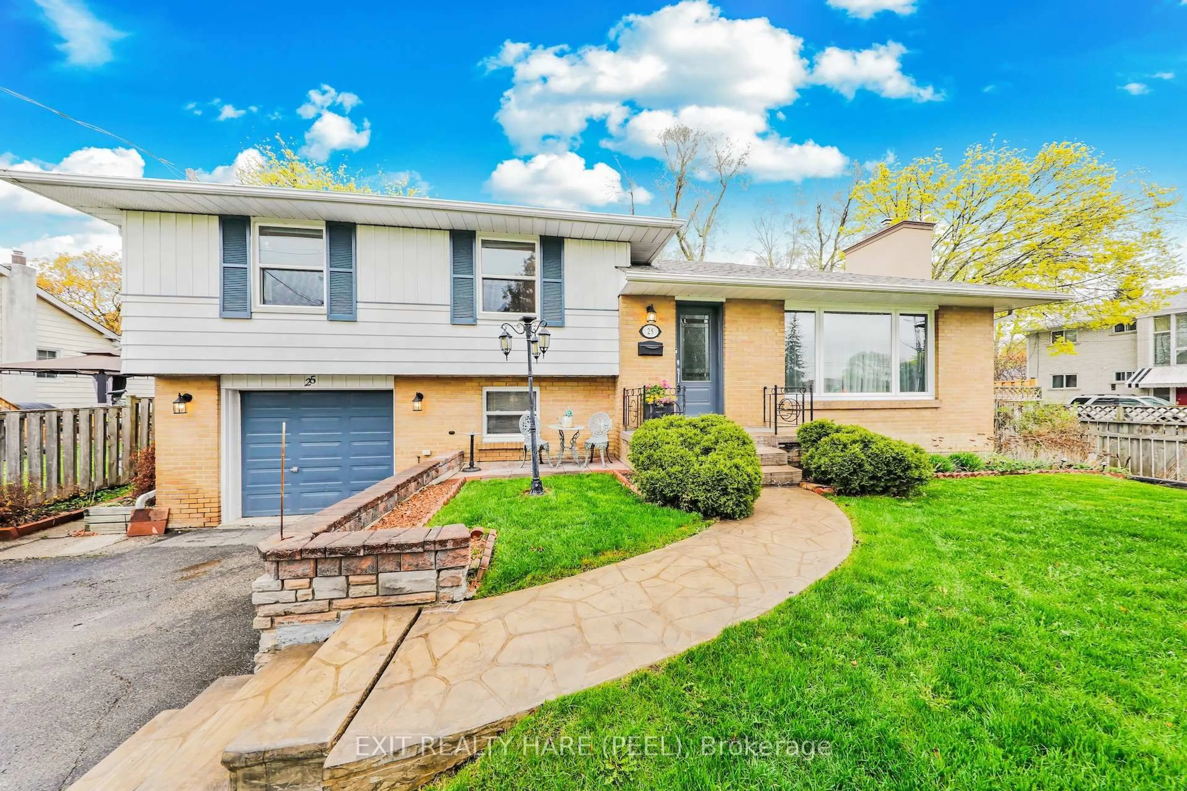 Home with vinyl exterior material, street for 25 McLaughlin Rd, Brampton Ontario L6X 1Y6
