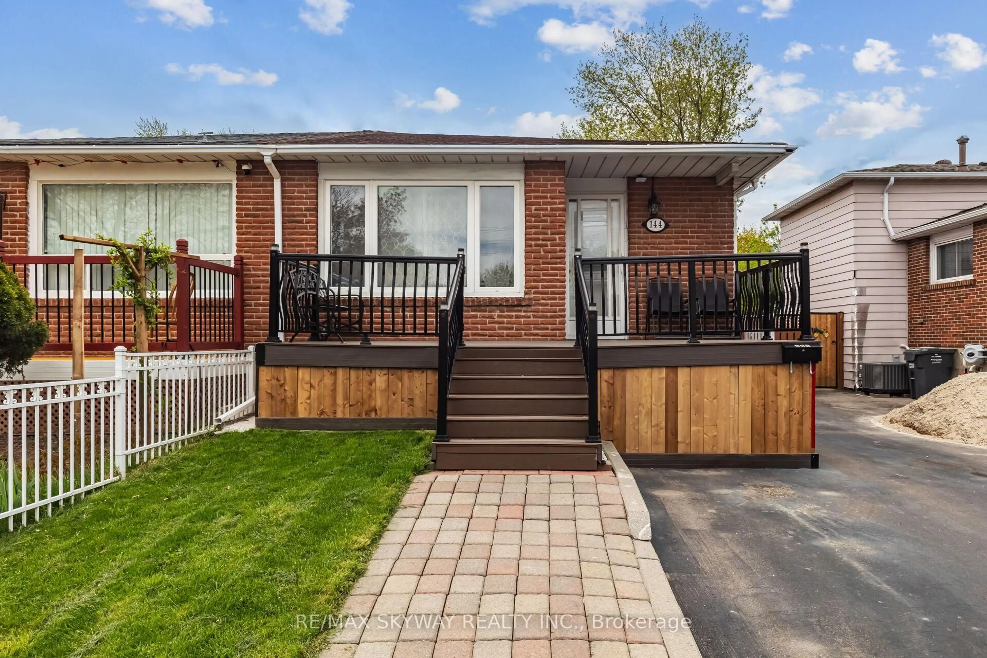 Home with brick exterior material, street for 144 Archdekin Dr, Brampton Ontario L6V 1Y7
