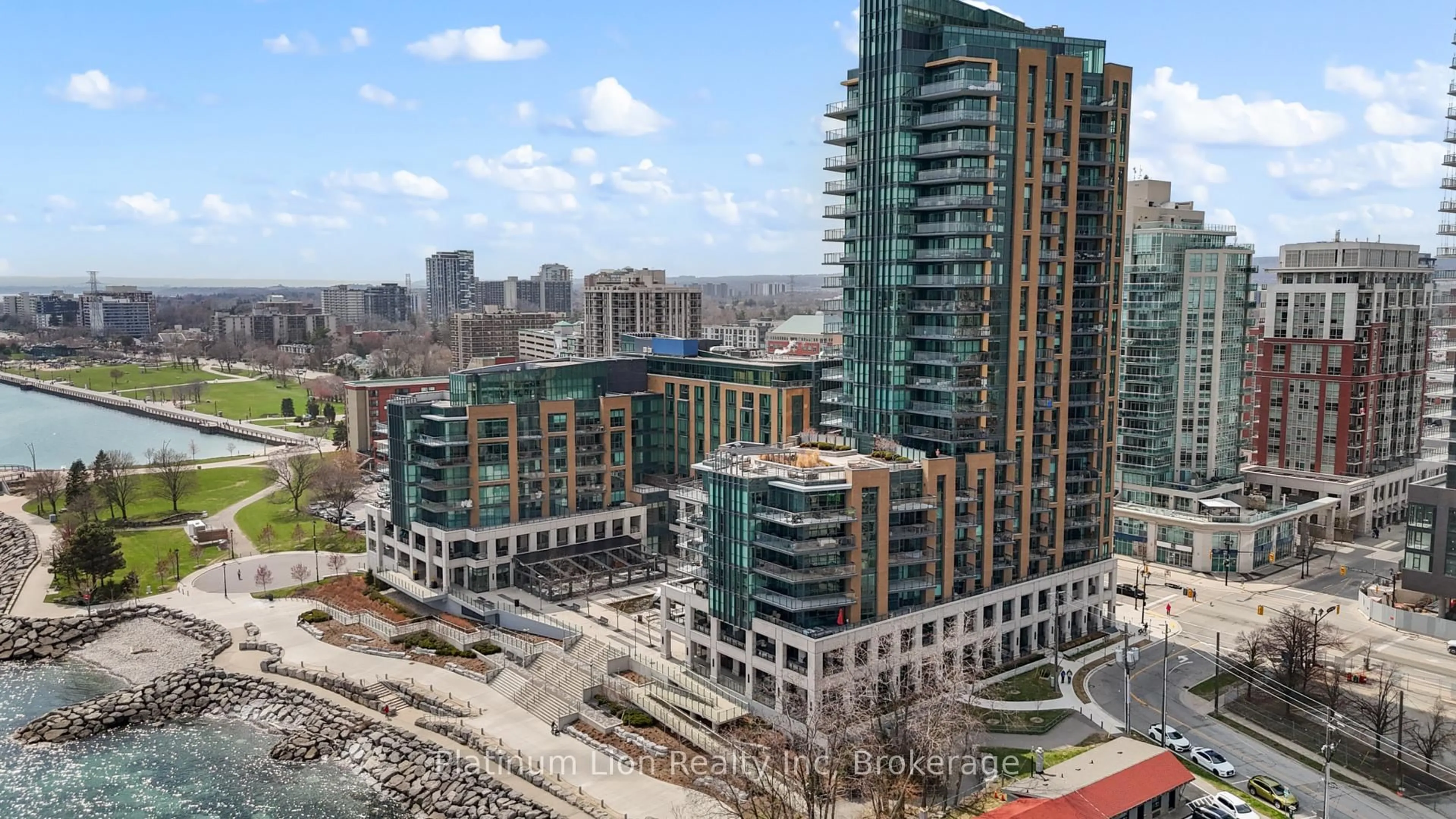 A pic from outside/outdoor area/front of a property/back of a property/a pic from drone, city buildings view from balcony for 2060 Lakeshore Rd #205, Burlington Ontario L7R 0G2