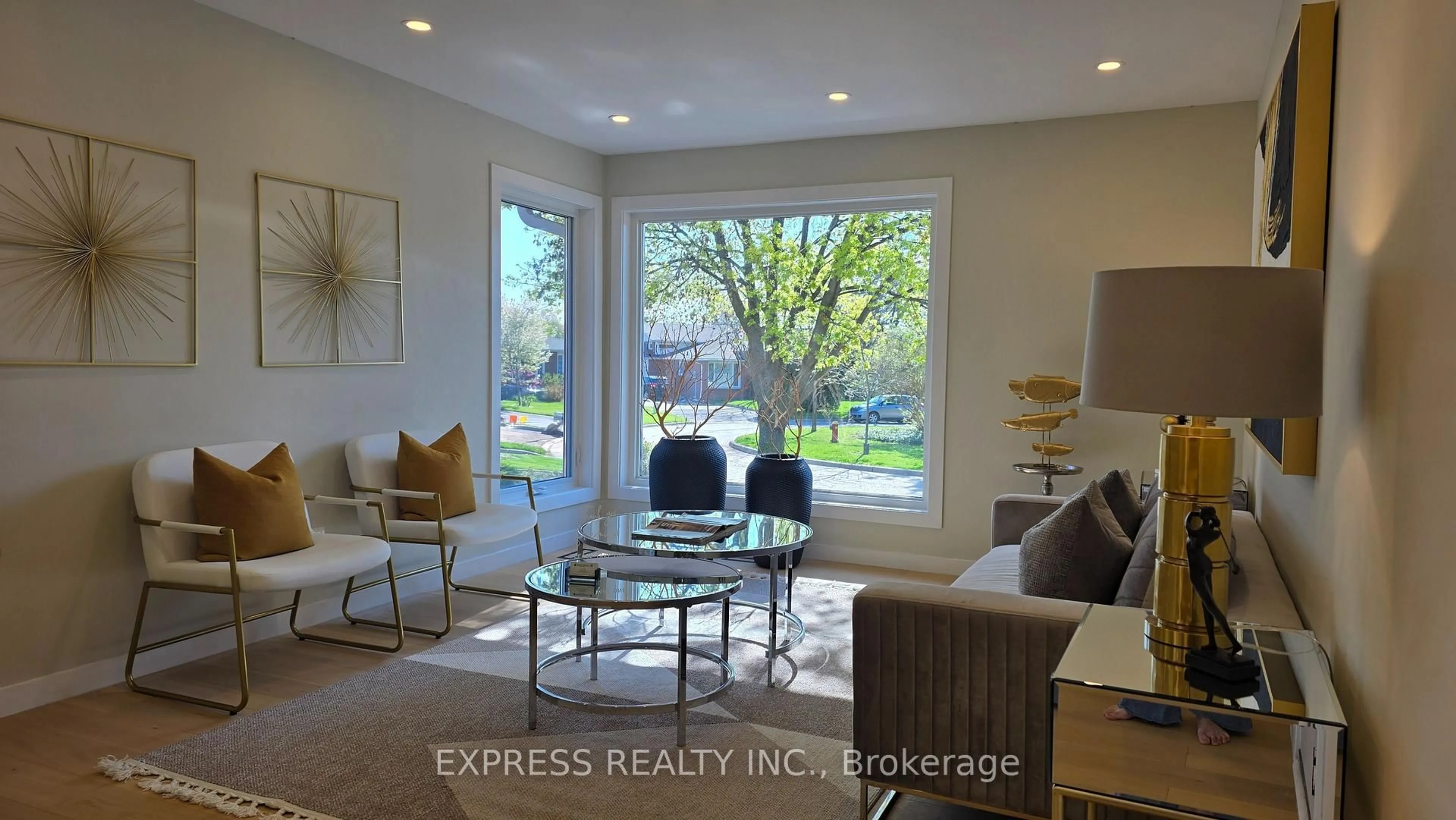 Living room with furniture, wood/laminate floor for 1215 Garthdale Crt, Oakville Ontario L6H 2M1