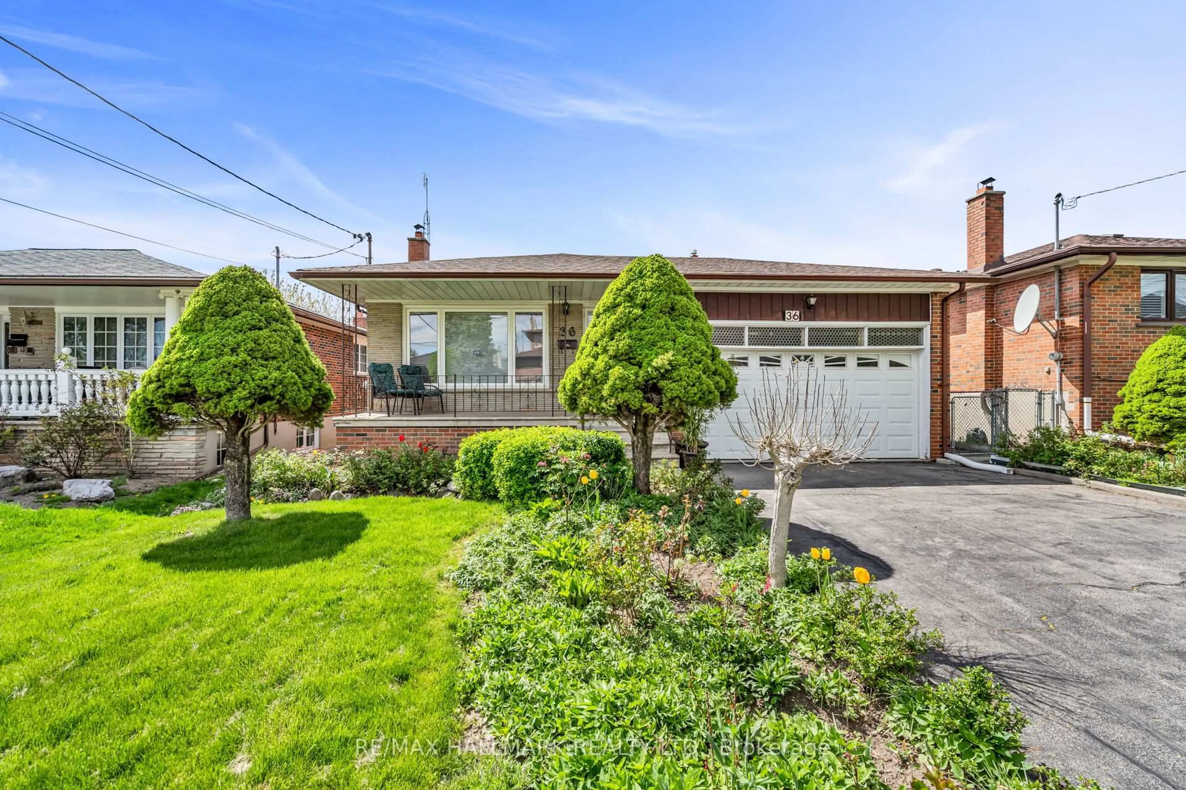 Home with brick exterior material, street for 36 Jasmine Rd, Toronto Ontario M9M 2P9