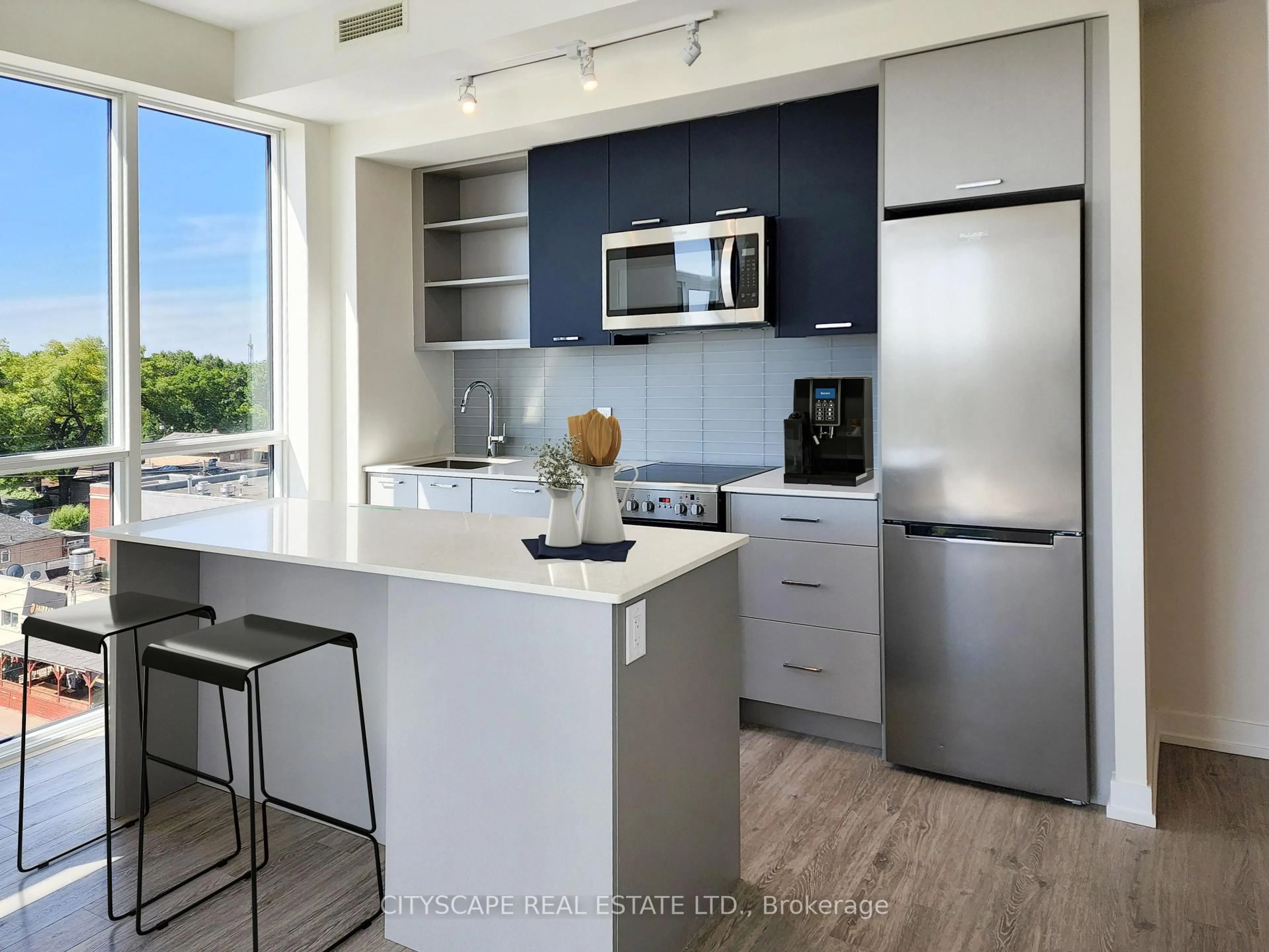 Open concept kitchen, ceramic/tile floor for 2300 St Clair Ave #608, Toronto Ontario M6N 1K8