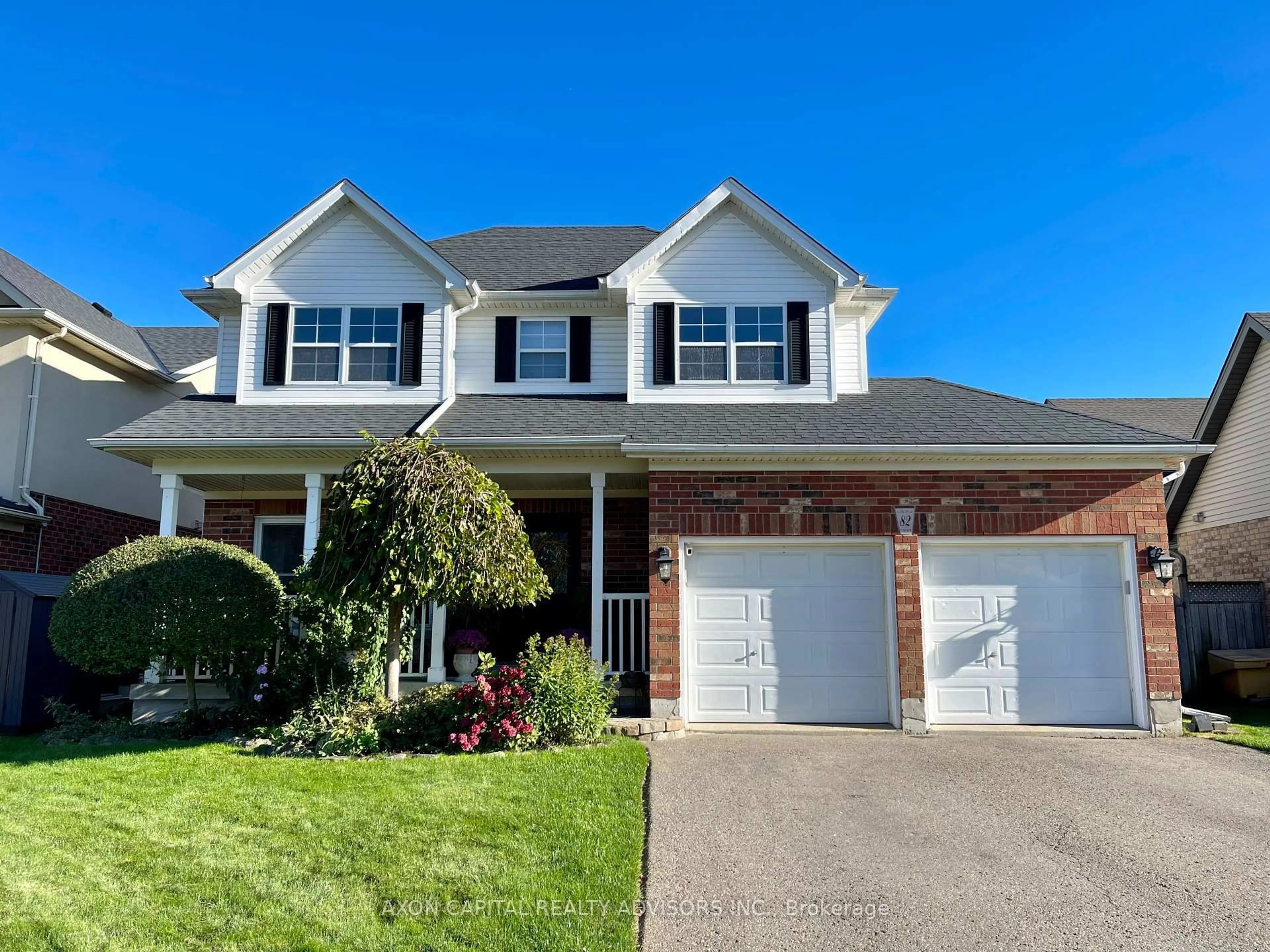 Home with vinyl exterior material, street for 82 Spencer Ave, Orangeville Ontario L9W 5H8