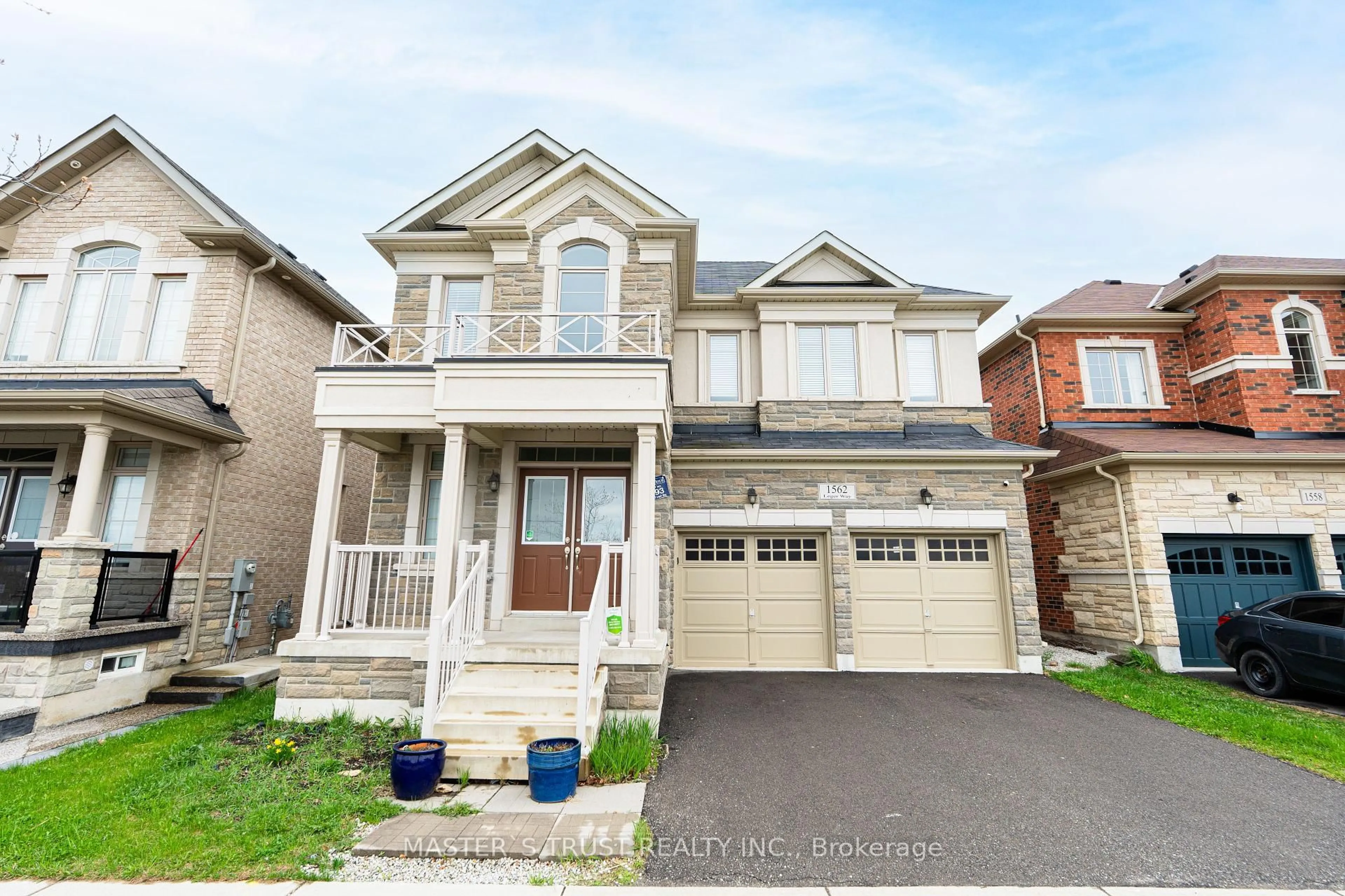 Home with brick exterior material, street for 1562 Leger Way, Milton Ontario L9E 1H4