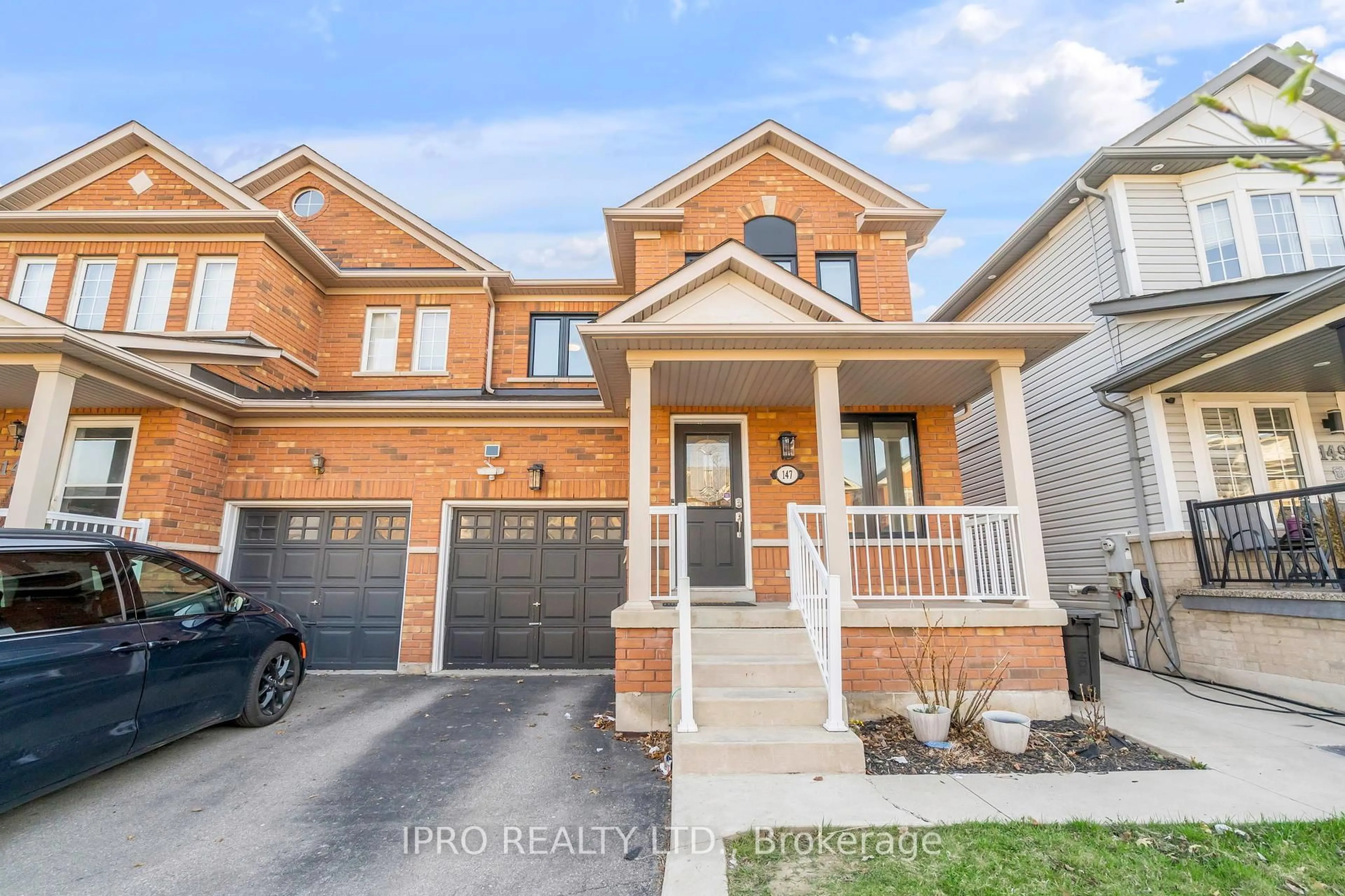 Home with brick exterior material, street for 147 Waters Blvd, Milton Ontario L9T 6K5