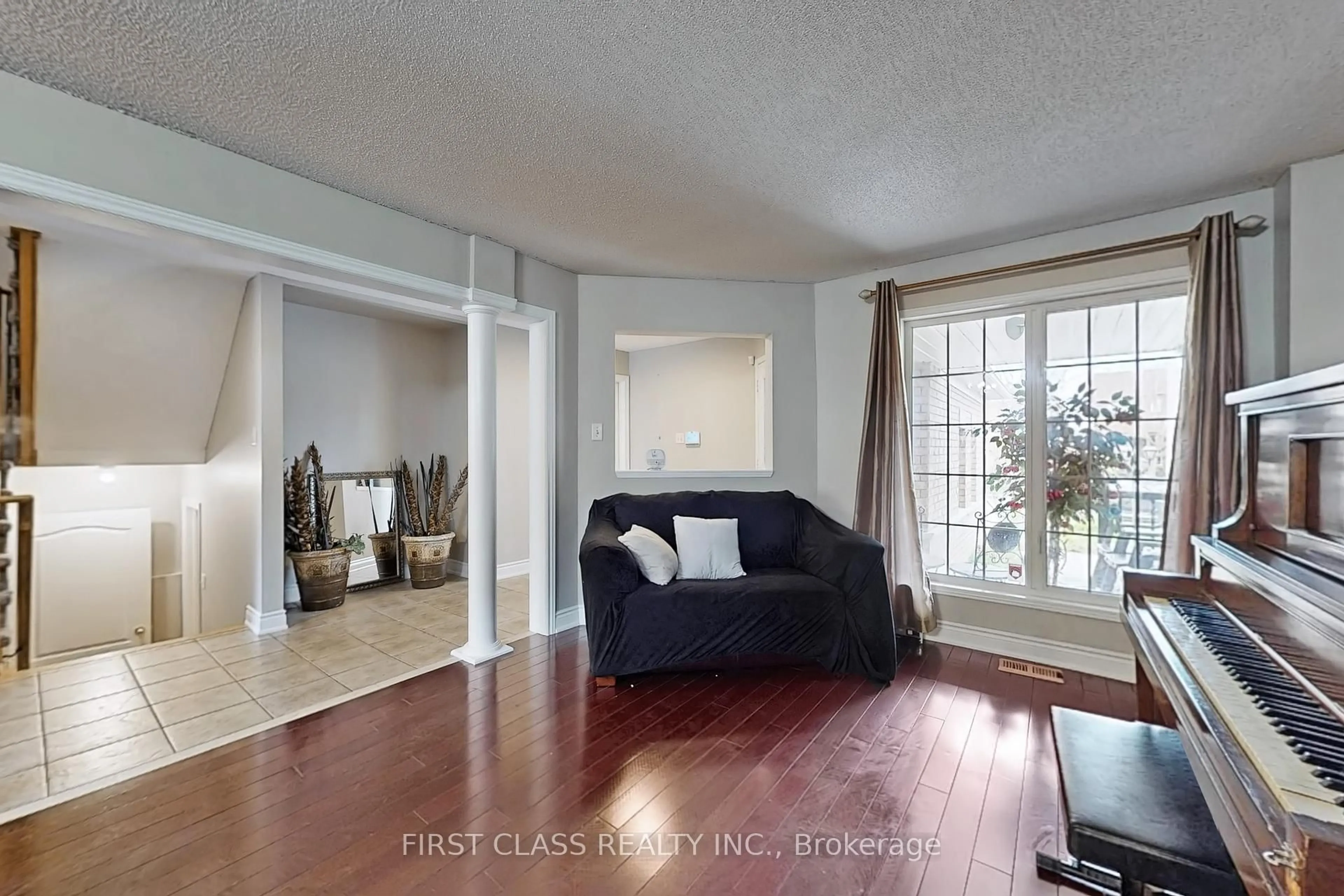 Living room with furniture, unknown for 73 Porchlight Rd, Brampton Ontario L6X 4S1