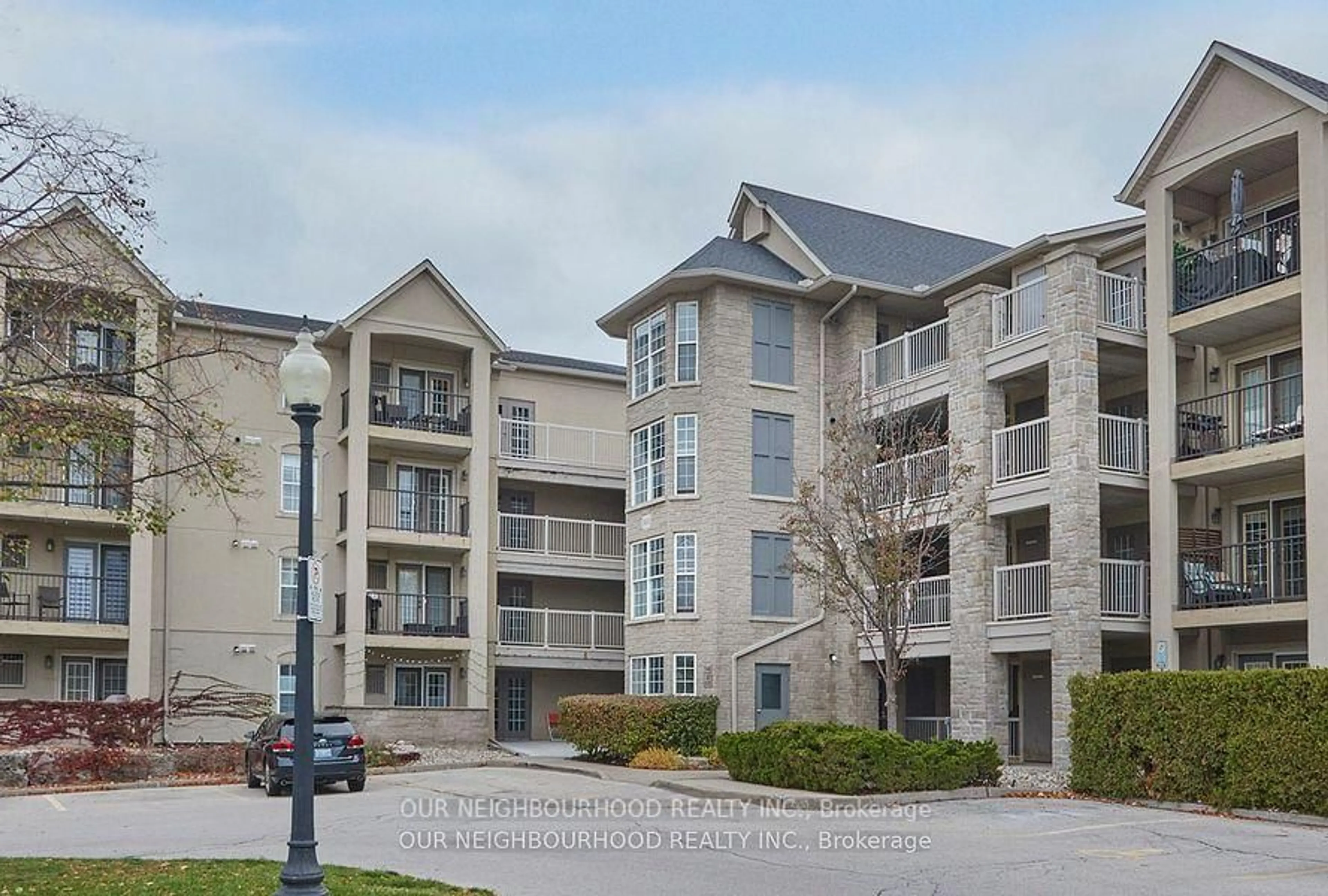 A pic from outside/outdoor area/front of a property/back of a property/a pic from drone, unknown for 1431 Walker's Line #208, Burlington Ontario L7M 4N9