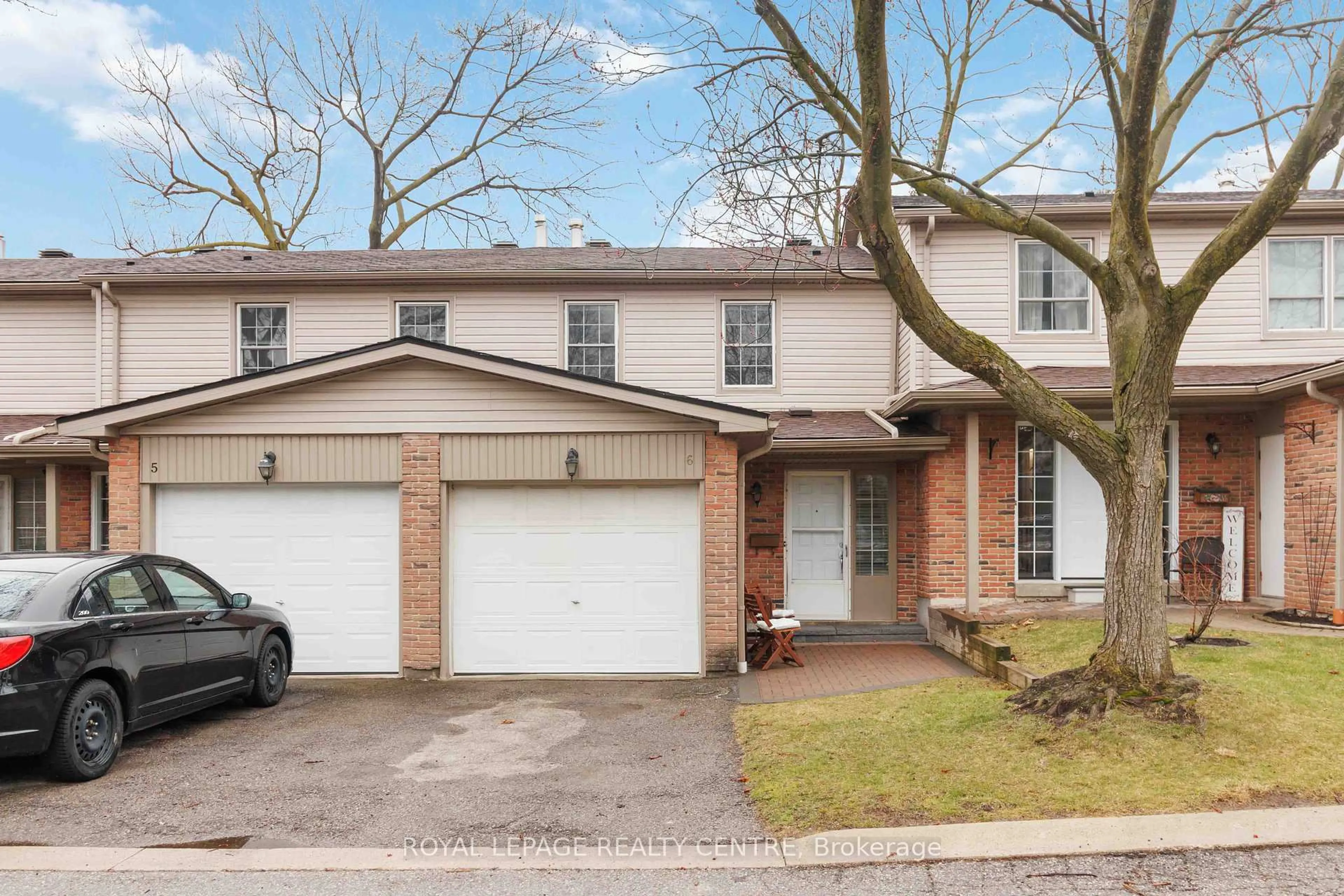 Home with brick exterior material, street for 3400 Rhonda Valy #6, Mississauga Ontario L5A 3L9