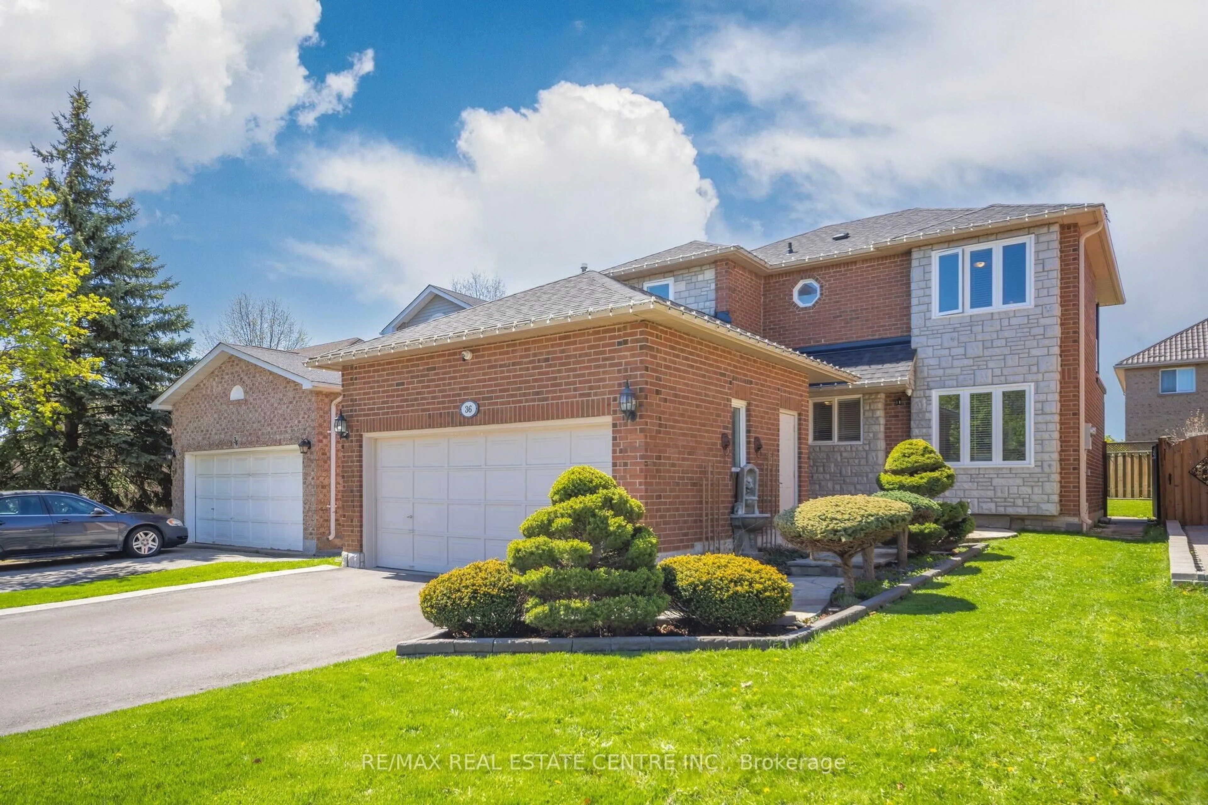 Home with brick exterior material, street for 36 Lockwood Rd, Brampton Ontario L6Y 4T7