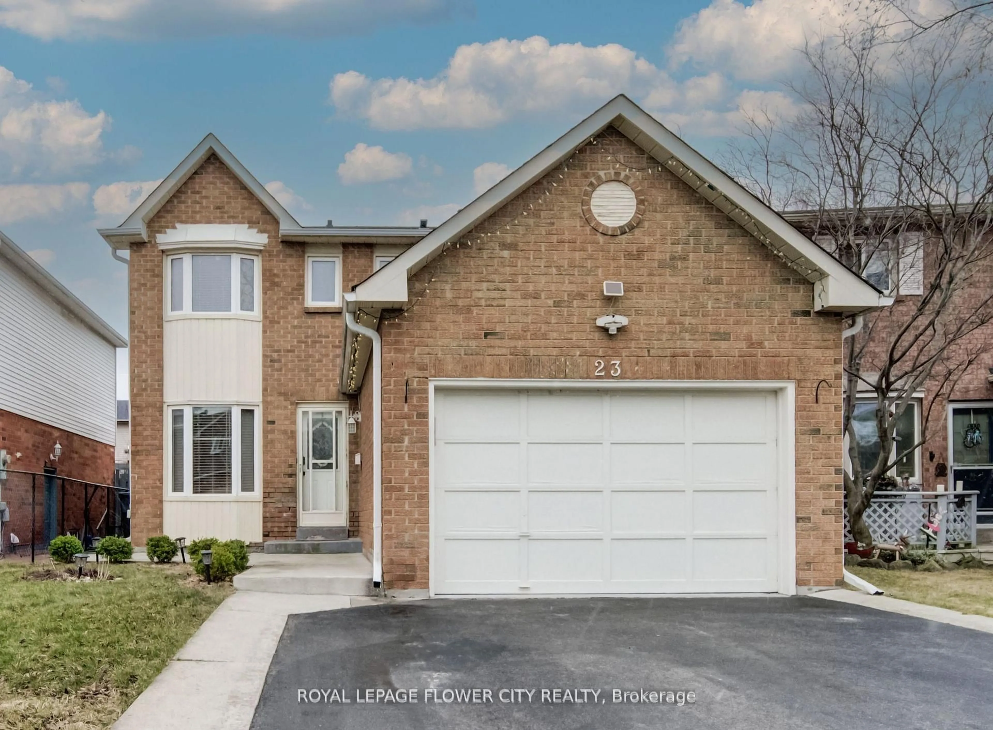 Home with brick exterior material, street for 23 Driftwood Cres, Brampton Ontario L6Z 2C3