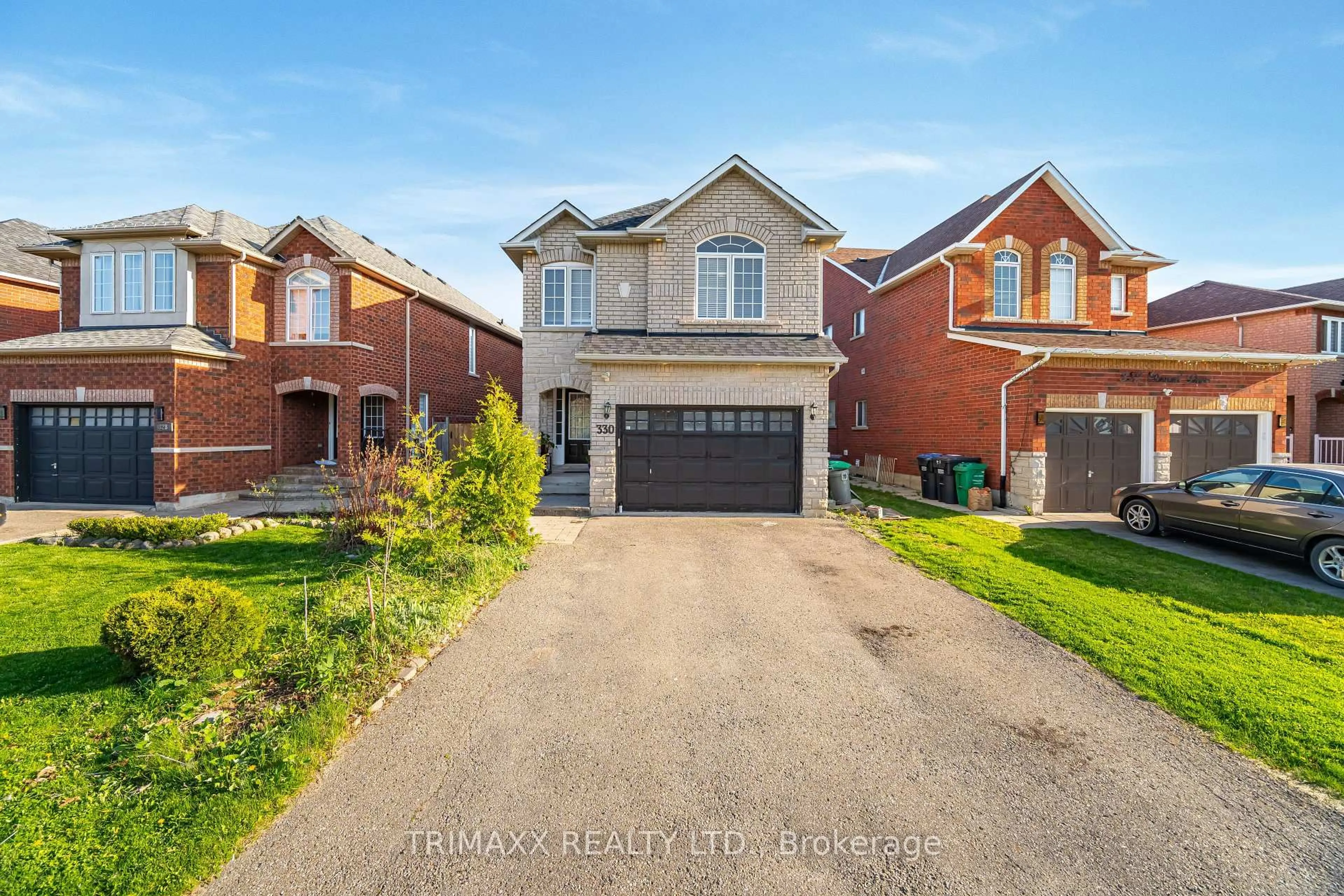 Home with brick exterior material, street for 330 Ellwood Dr, Caledon Ontario L7E 2G9
