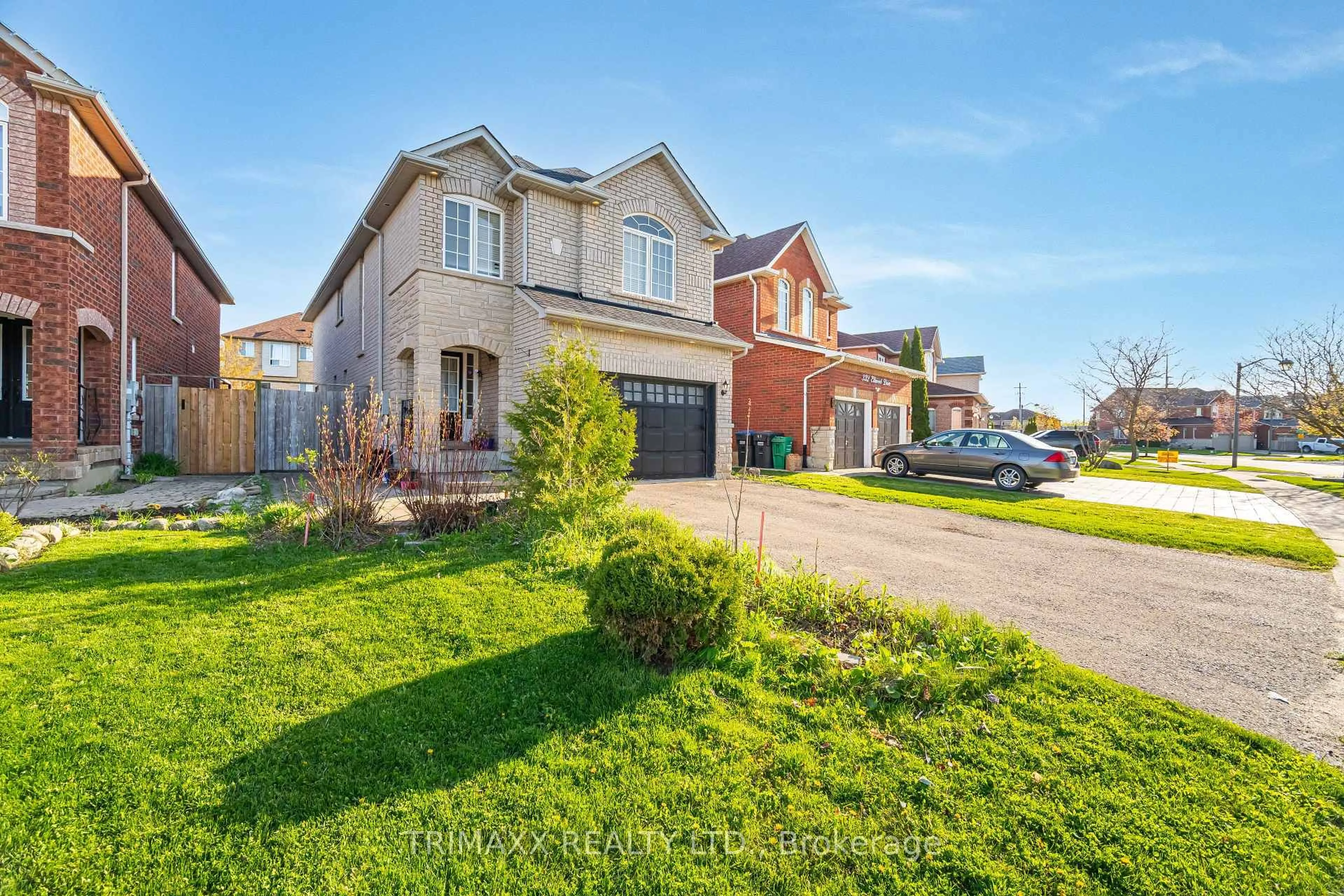 Home with brick exterior material, street for 330 Ellwood Dr, Caledon Ontario L7E 2G9