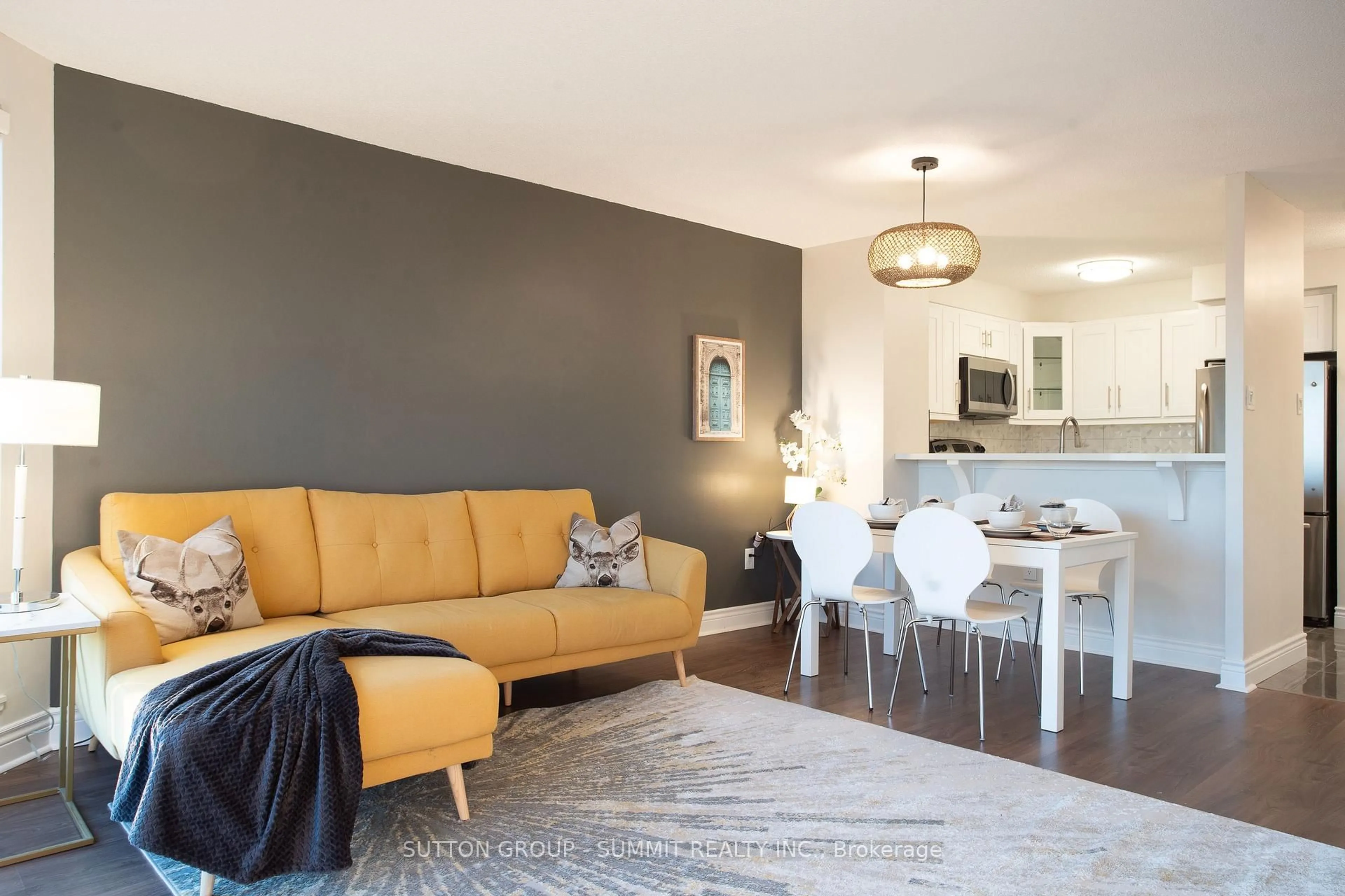 Living room with furniture, wood/laminate floor for 2155 Burnhamthorpe Rd #1208, Mississauga Ontario L5L 5P4