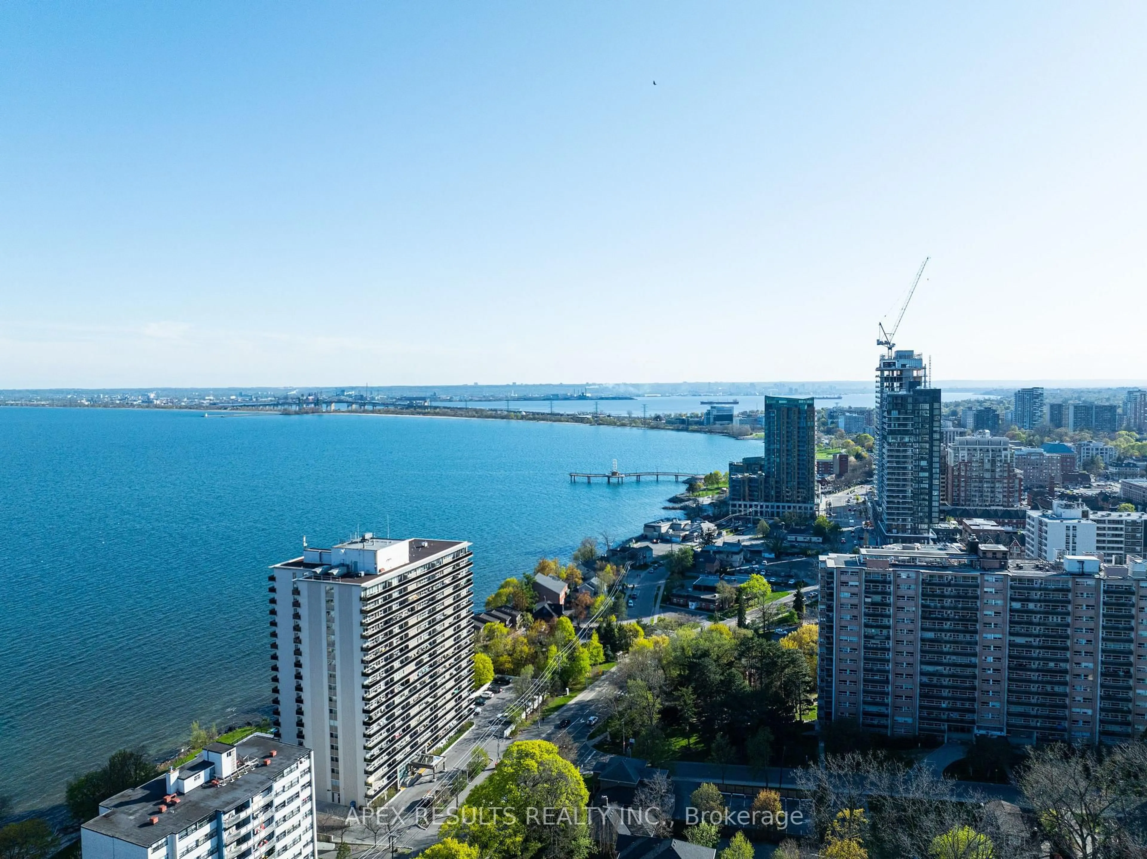 A pic from outside/outdoor area/front of a property/back of a property/a pic from drone, water/lake/river/ocean view for 2260 New St, Burlington Ontario L7R 1J3