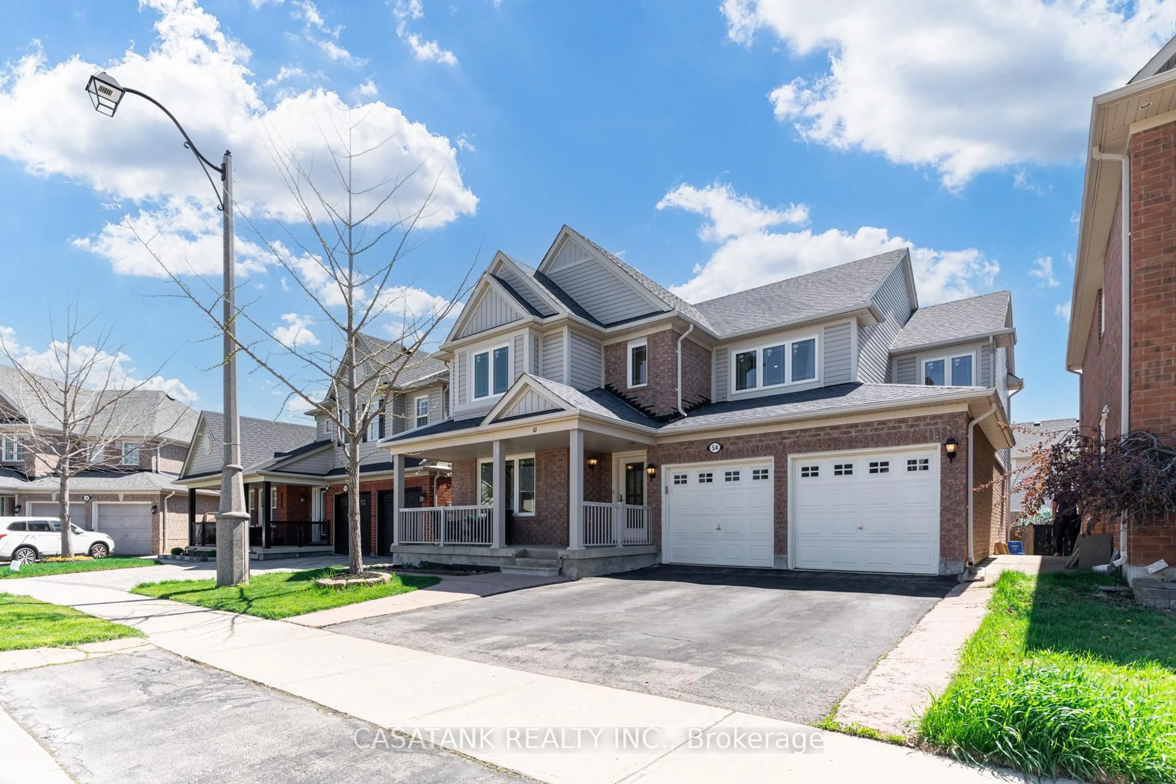 Home with brick exterior material, street for 54 Emmett Circ, Brampton Ontario L7A 3M2