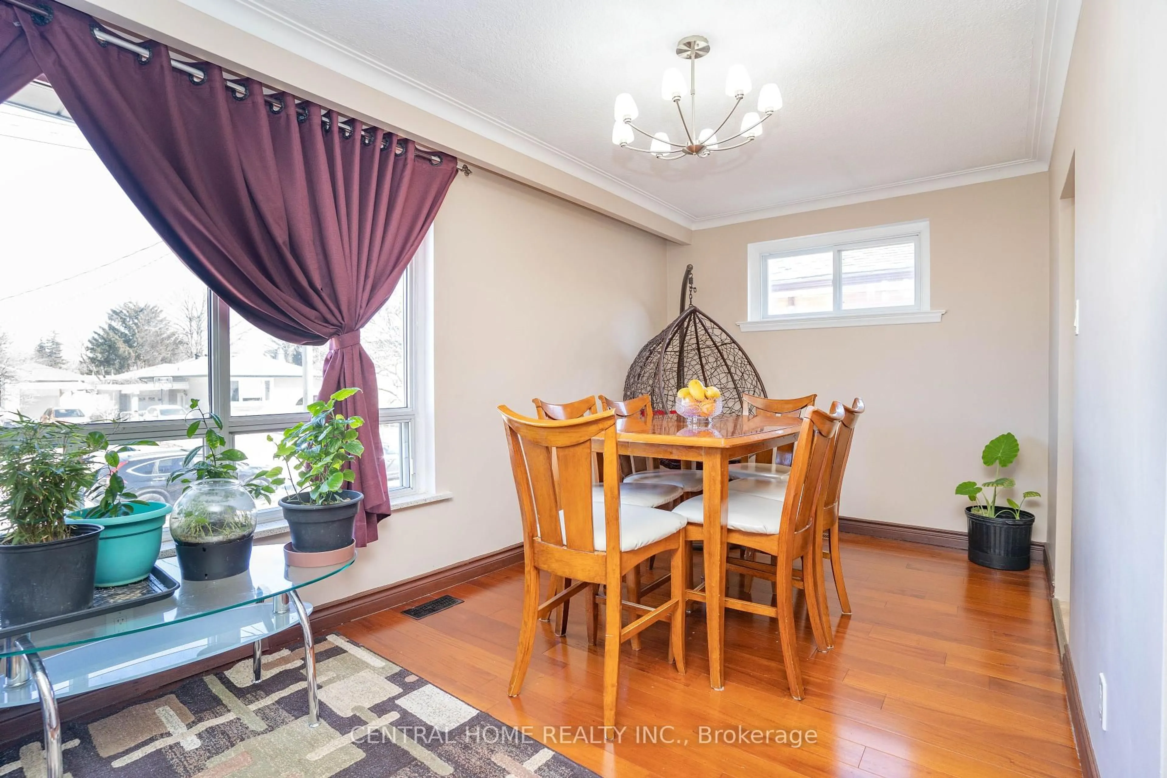 Dining room, wood/laminate floor for 20 Bridgenorth Cres, Toronto Ontario M9V 2M3