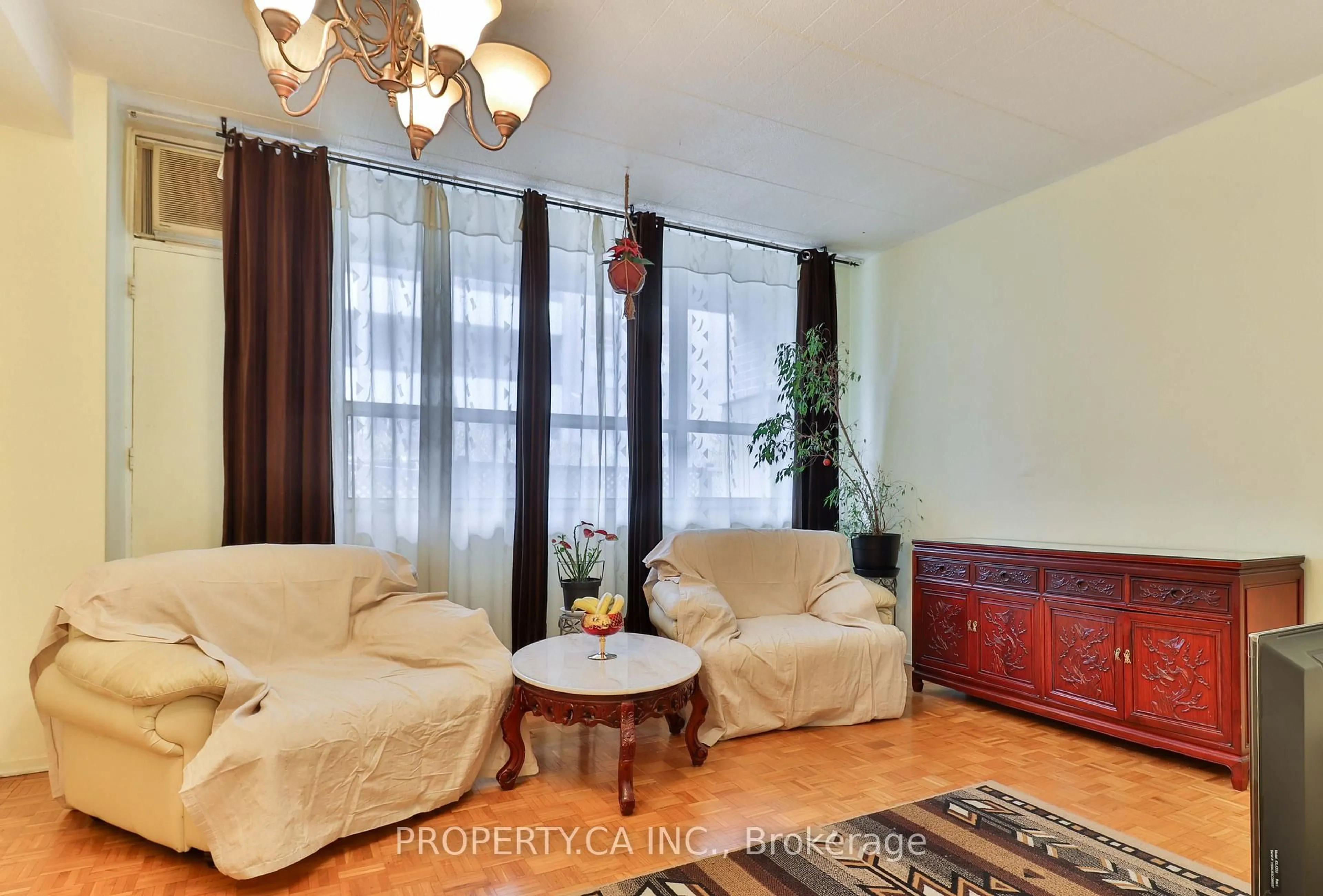 Living room with furniture, unknown for 3625 Lakeshore Blvd #108, Toronto Ontario M8W 4W2