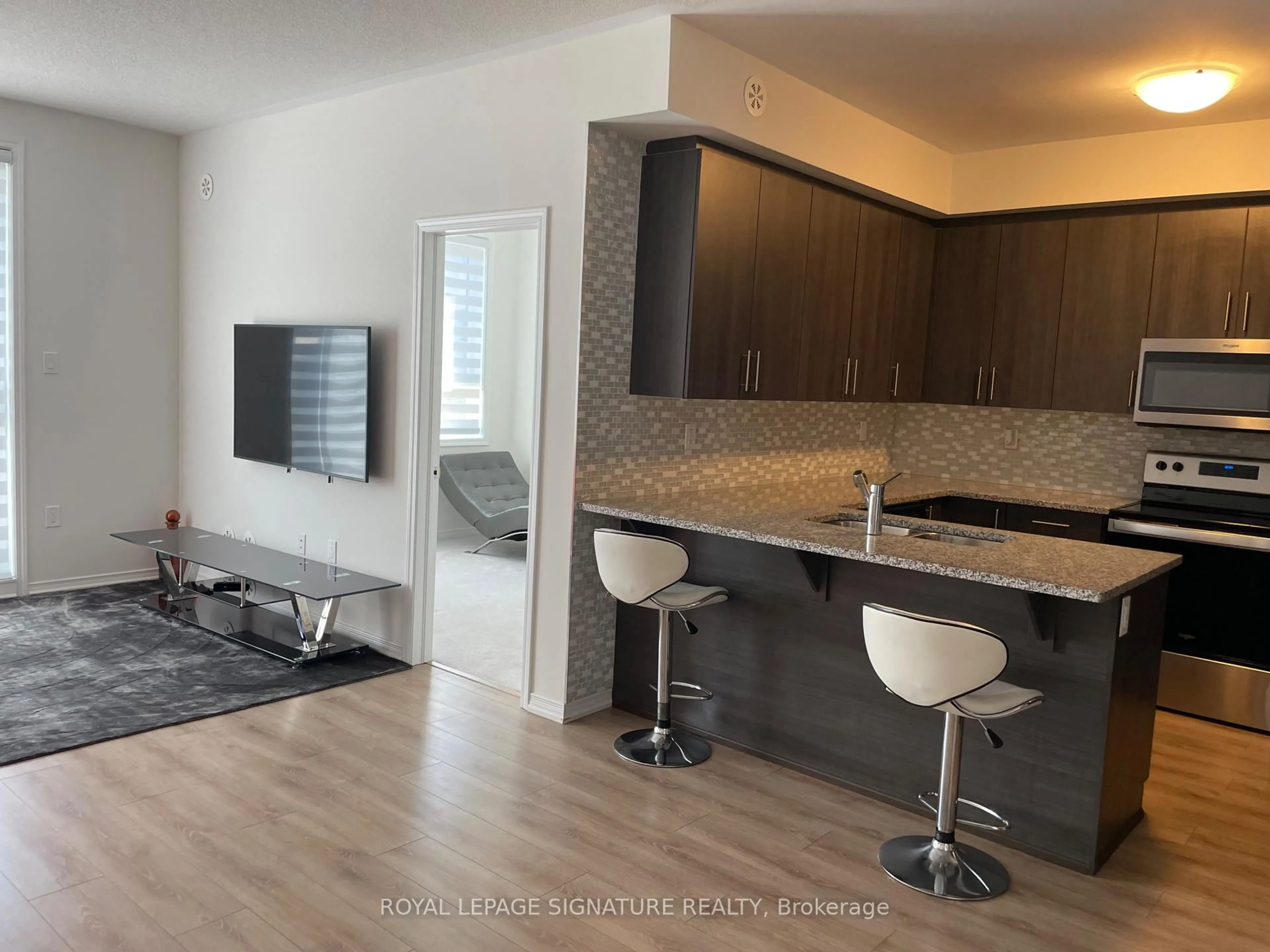 Open concept kitchen, wood/laminate floor for 20 Woodstream Dr #11, Toronto Ontario M9W 0G1
