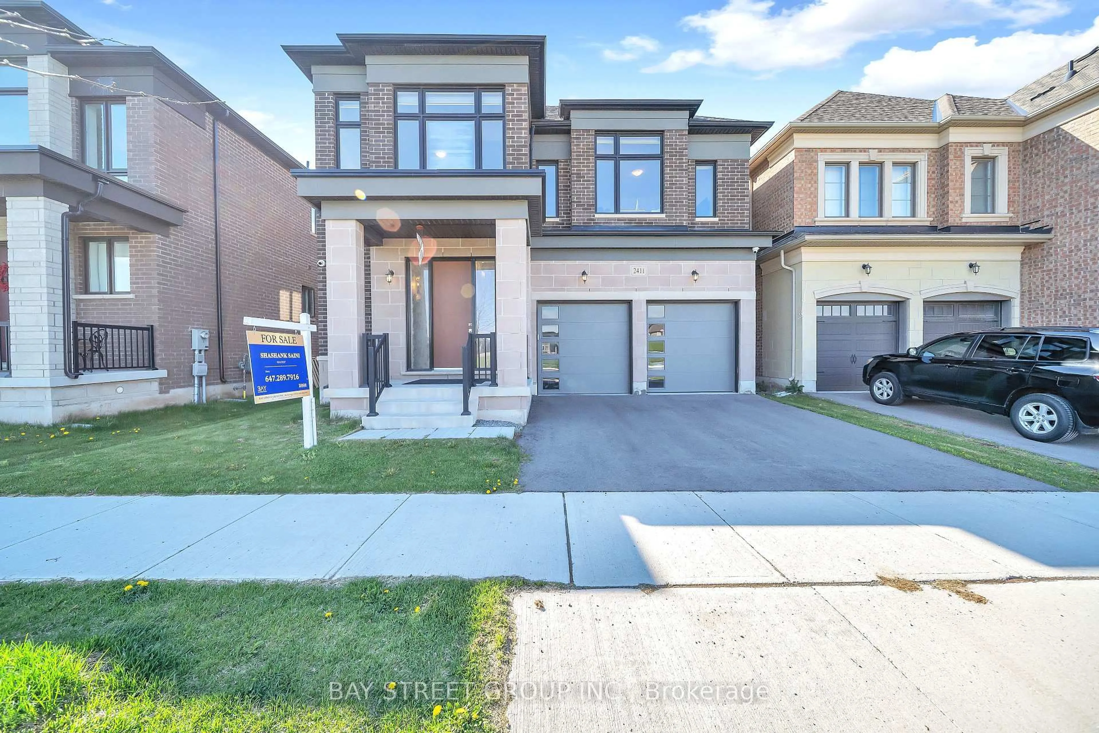 Home with brick exterior material, street for 2411 Saw Whet Blvd, Oakville Ontario L6M 5L5
