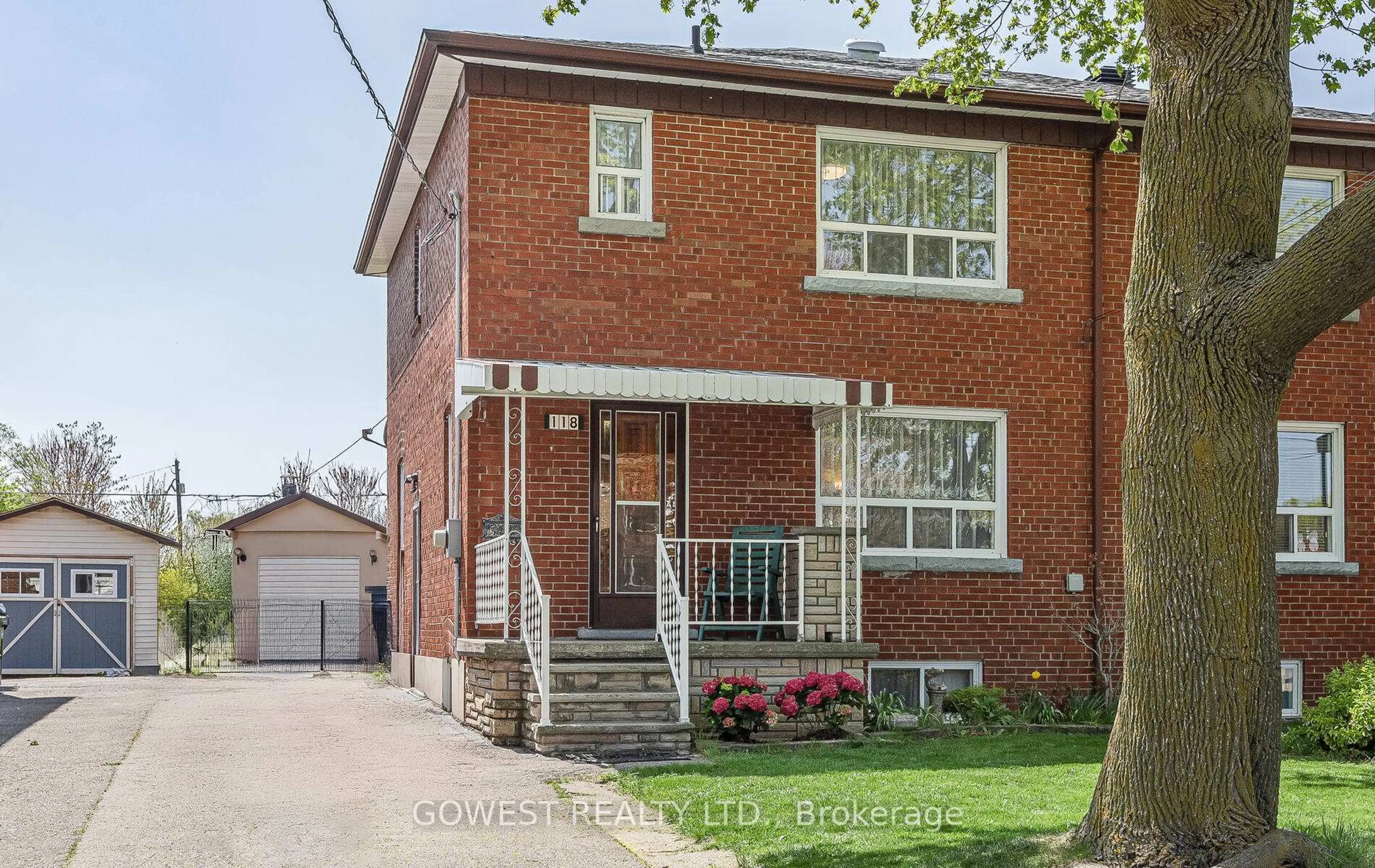 Home with brick exterior material, street for 118 Treeview Dr, Toronto Ontario M8W 4C3