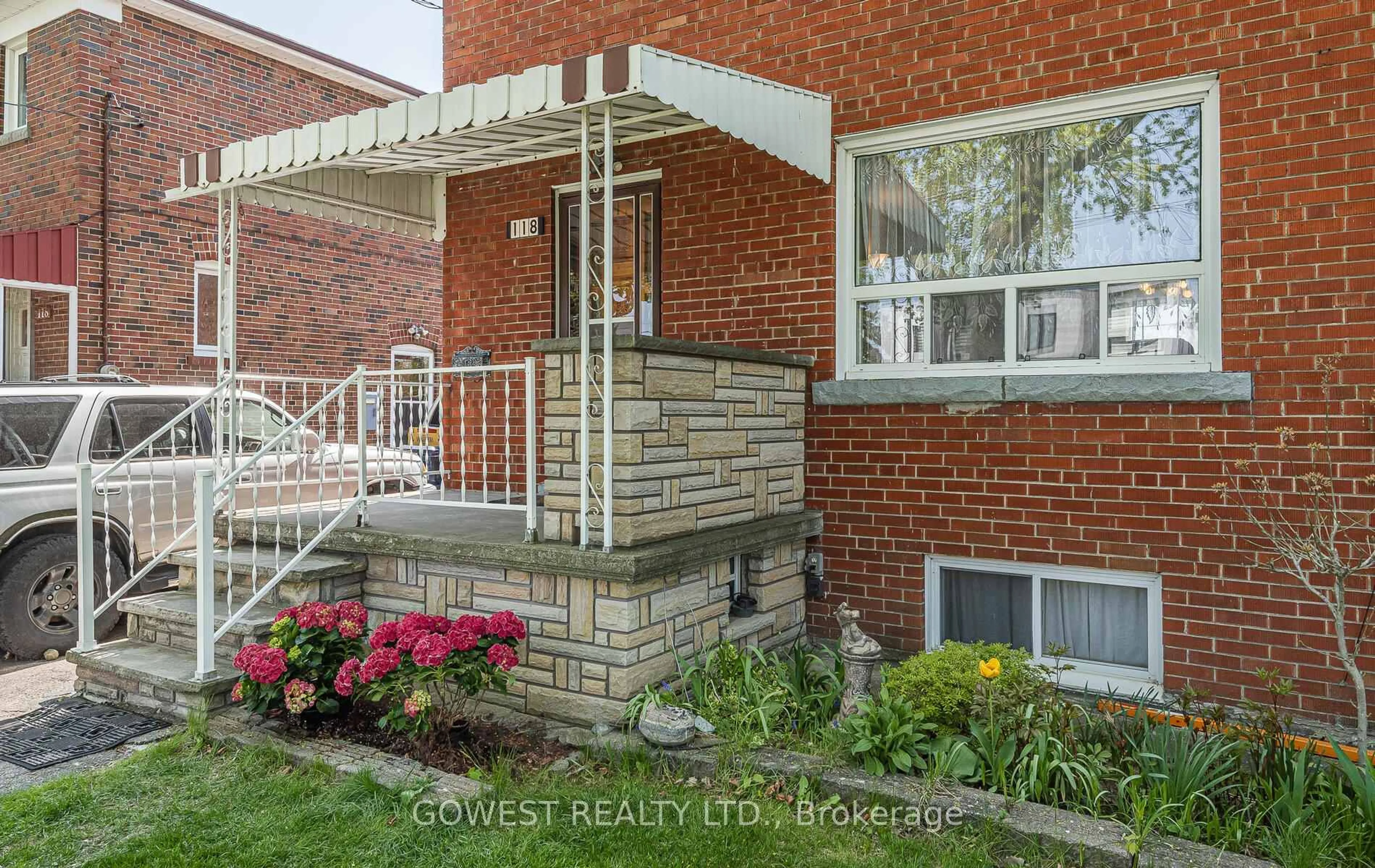 Home with brick exterior material, street for 118 Treeview Dr, Toronto Ontario M8W 4C3