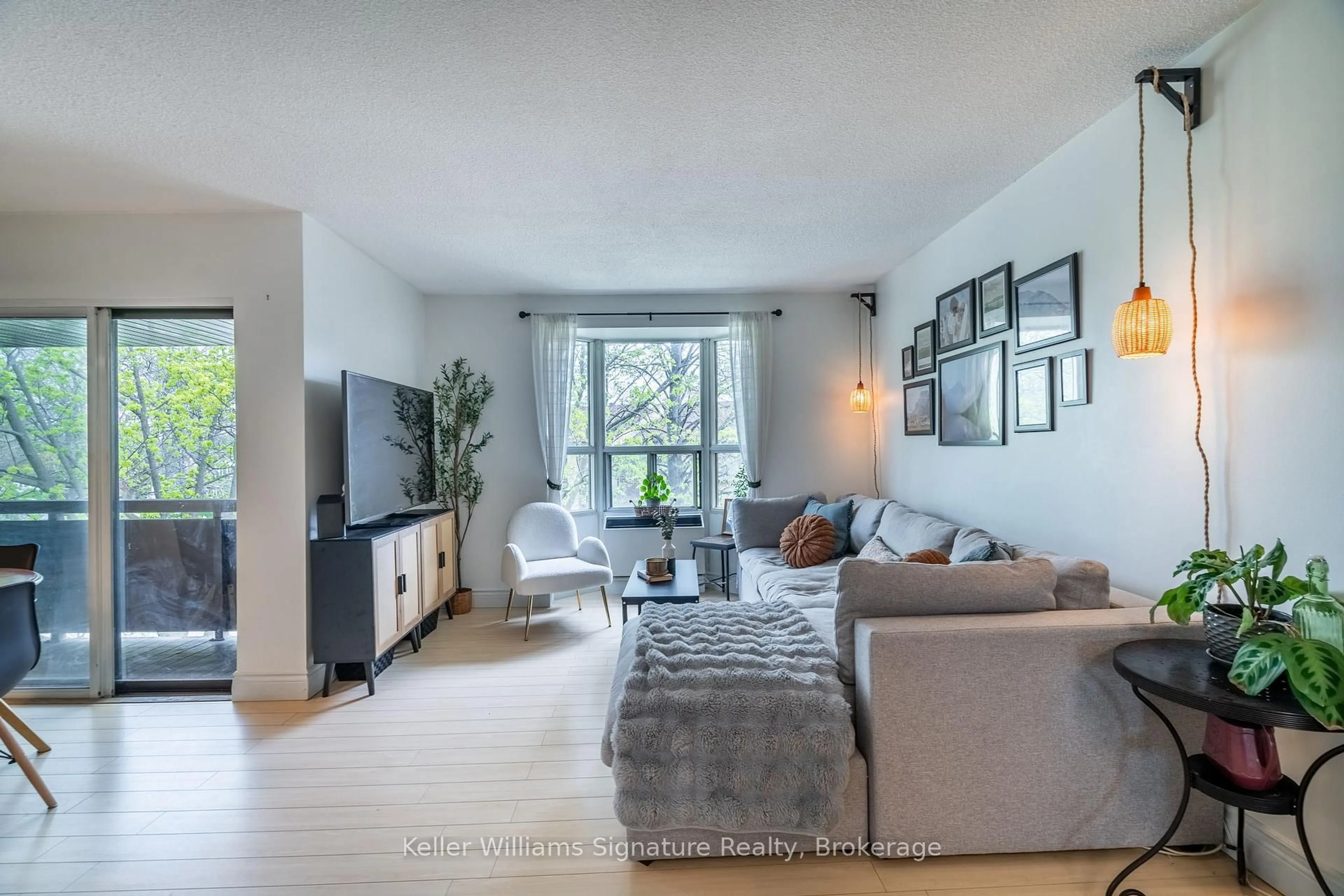 Living room with furniture, unknown for 3835 Lake Shore Blvd #305, Toronto Ontario M8W 1R2