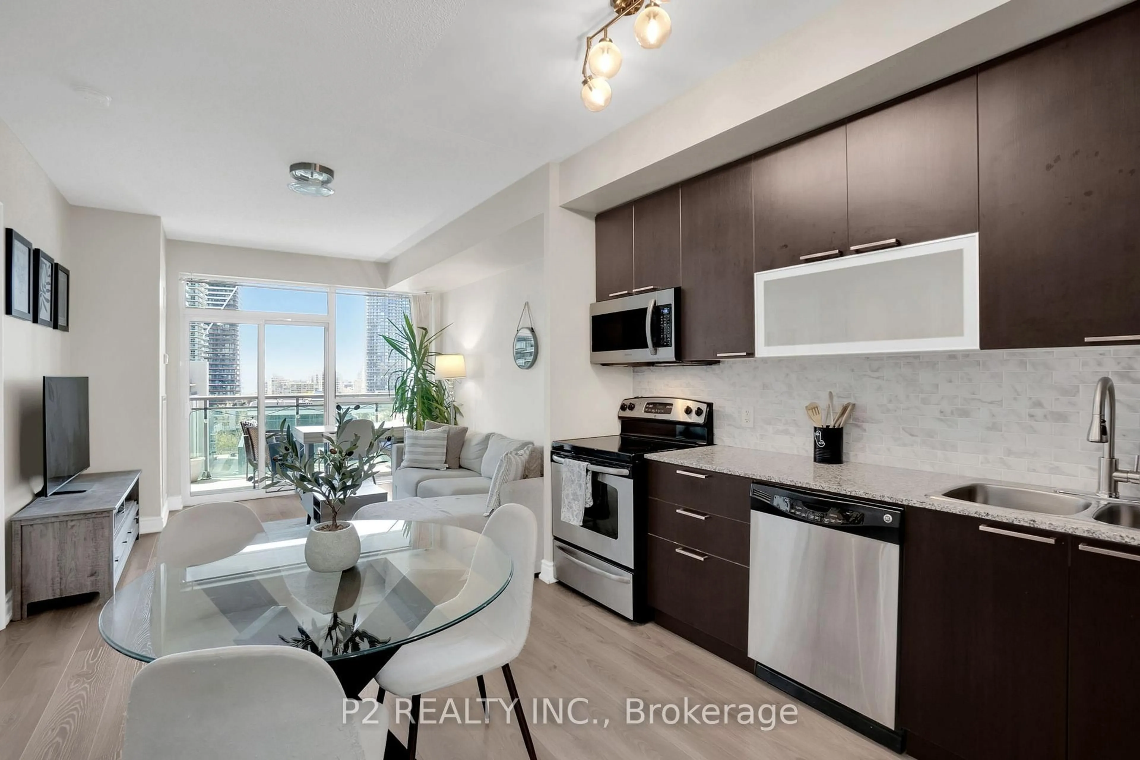 Open concept kitchen, ceramic/tile floor for 16 Brookers Lane #1002, Toronto Ontario M8V 0A5