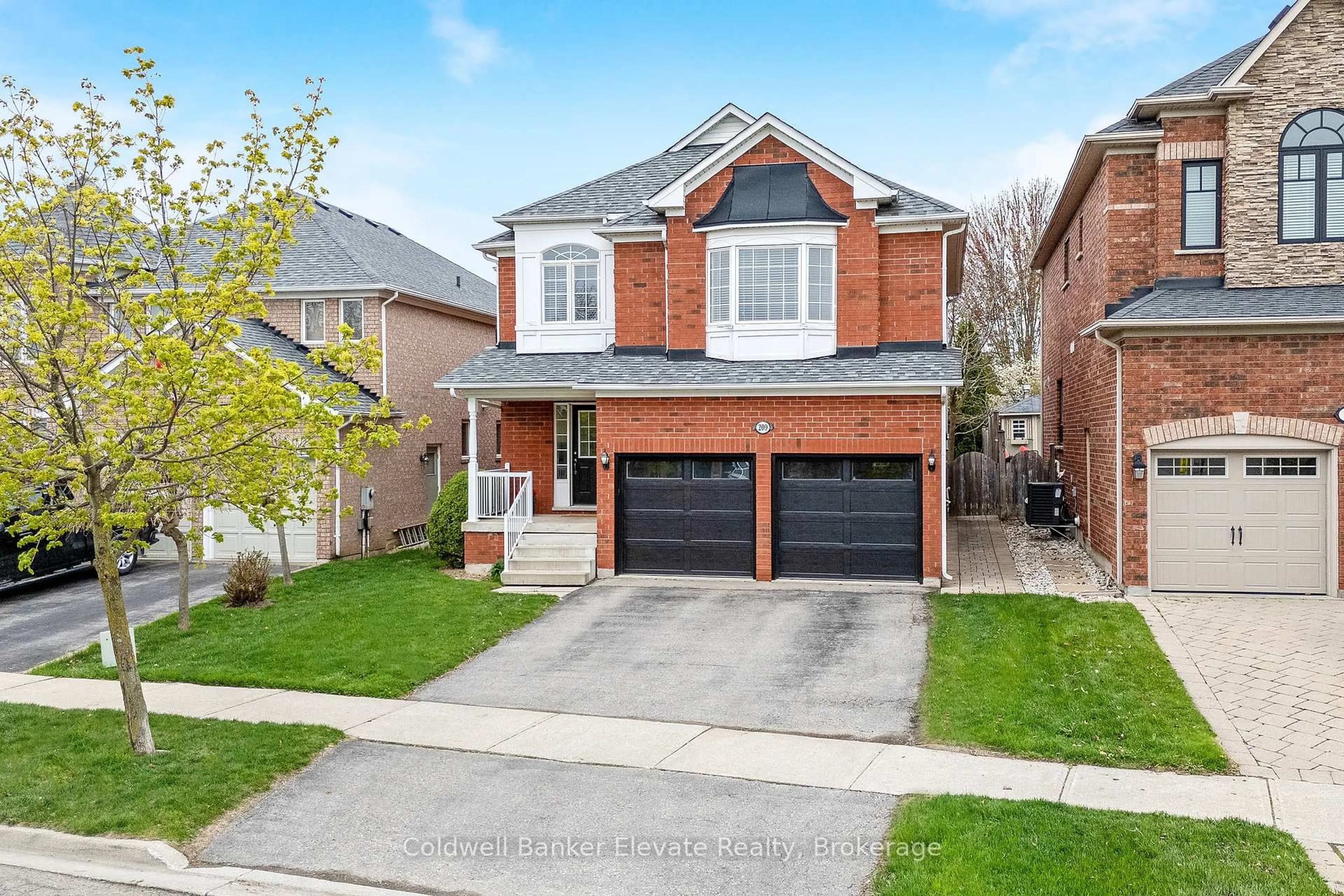 Home with brick exterior material, street for 209 Eaton St, Halton Hills Ontario L7G 5Y2