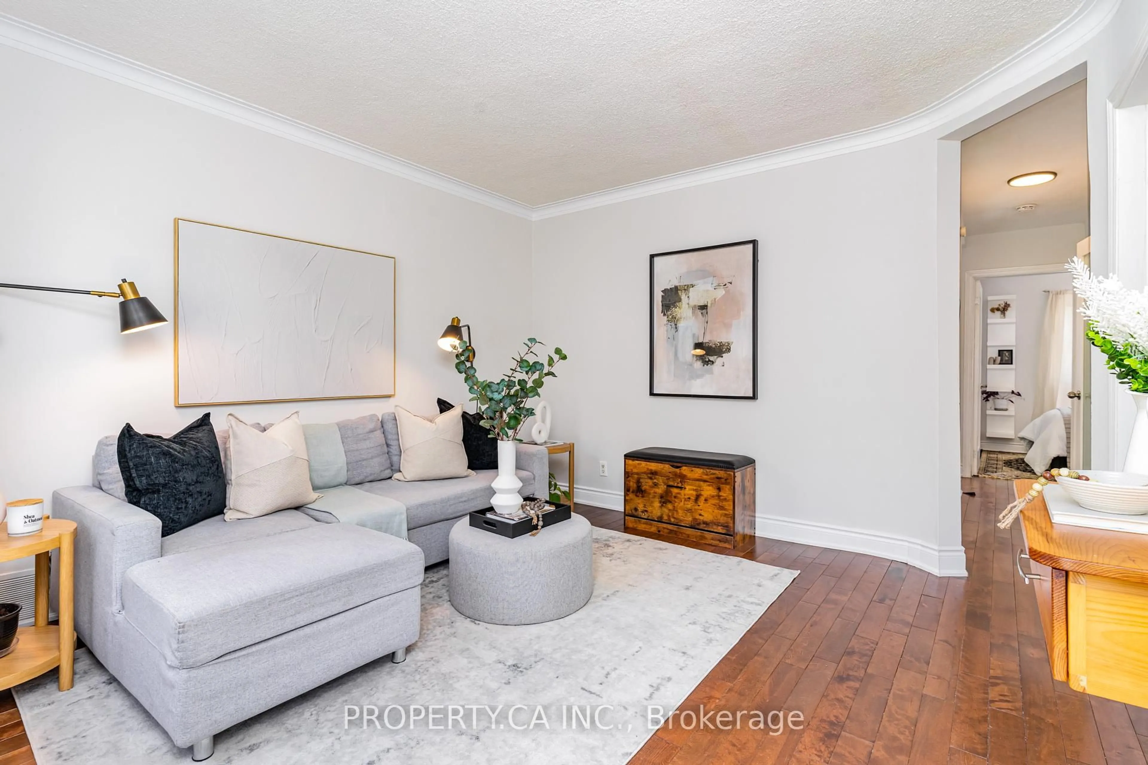 Living room with furniture, wood/laminate floor for 69 Jasper Ave, Toronto Ontario M6N 2N2